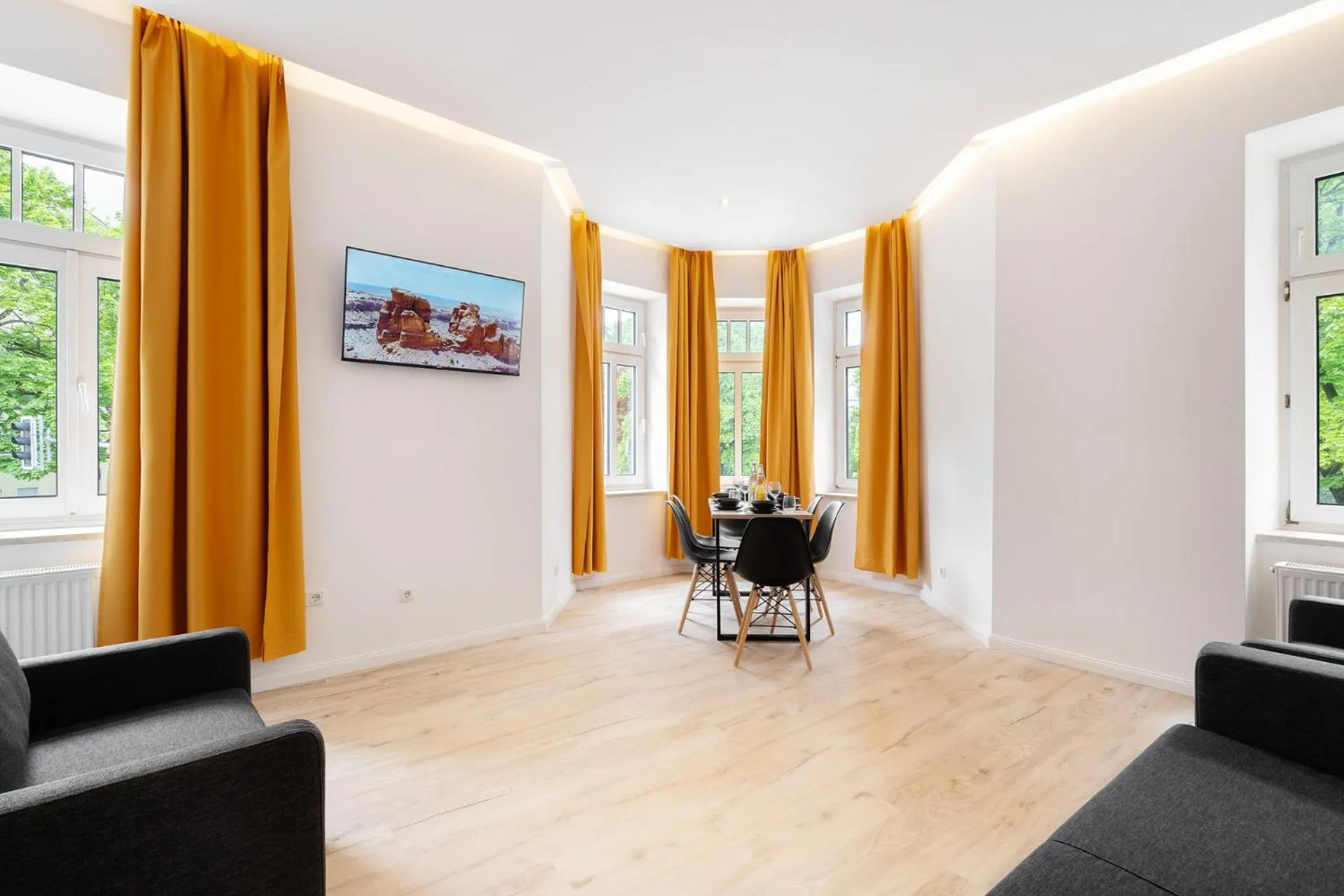 Seating area in Servus Apartments by Homaris