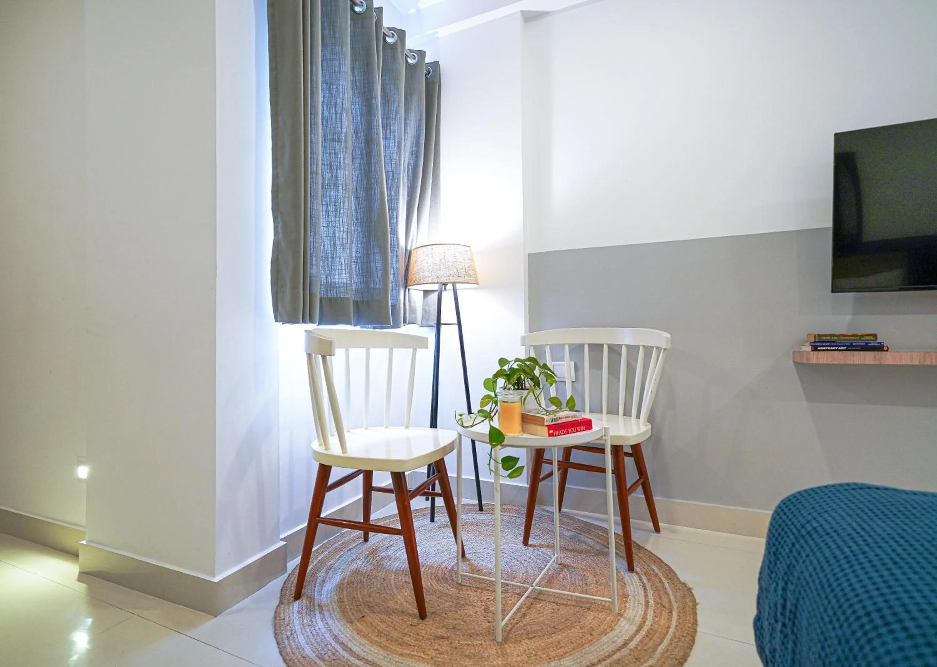 Seating area in Olive Hotel HAL 2nd Stage by Embassy Group