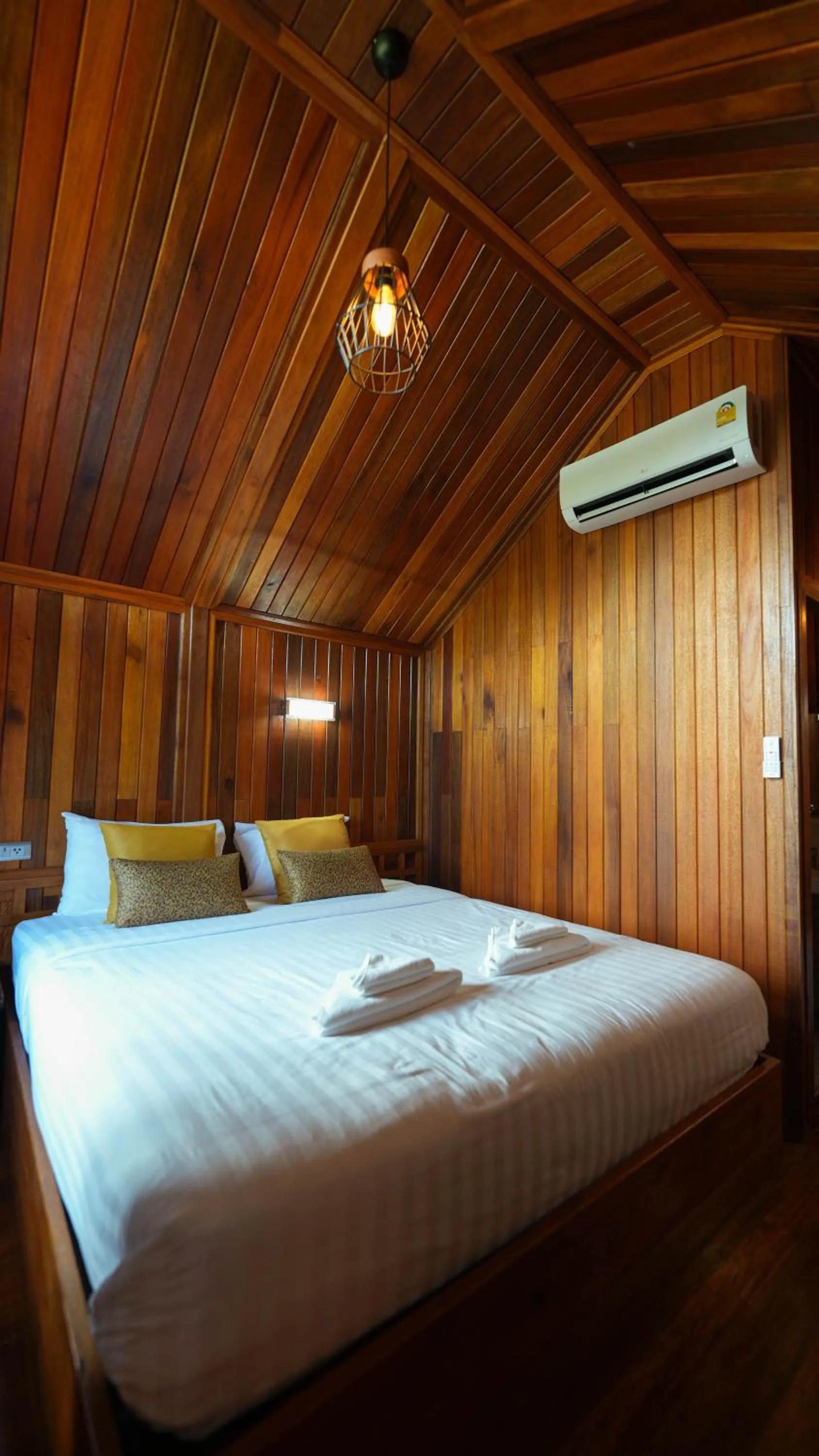 Bed in So View Phuket Resort