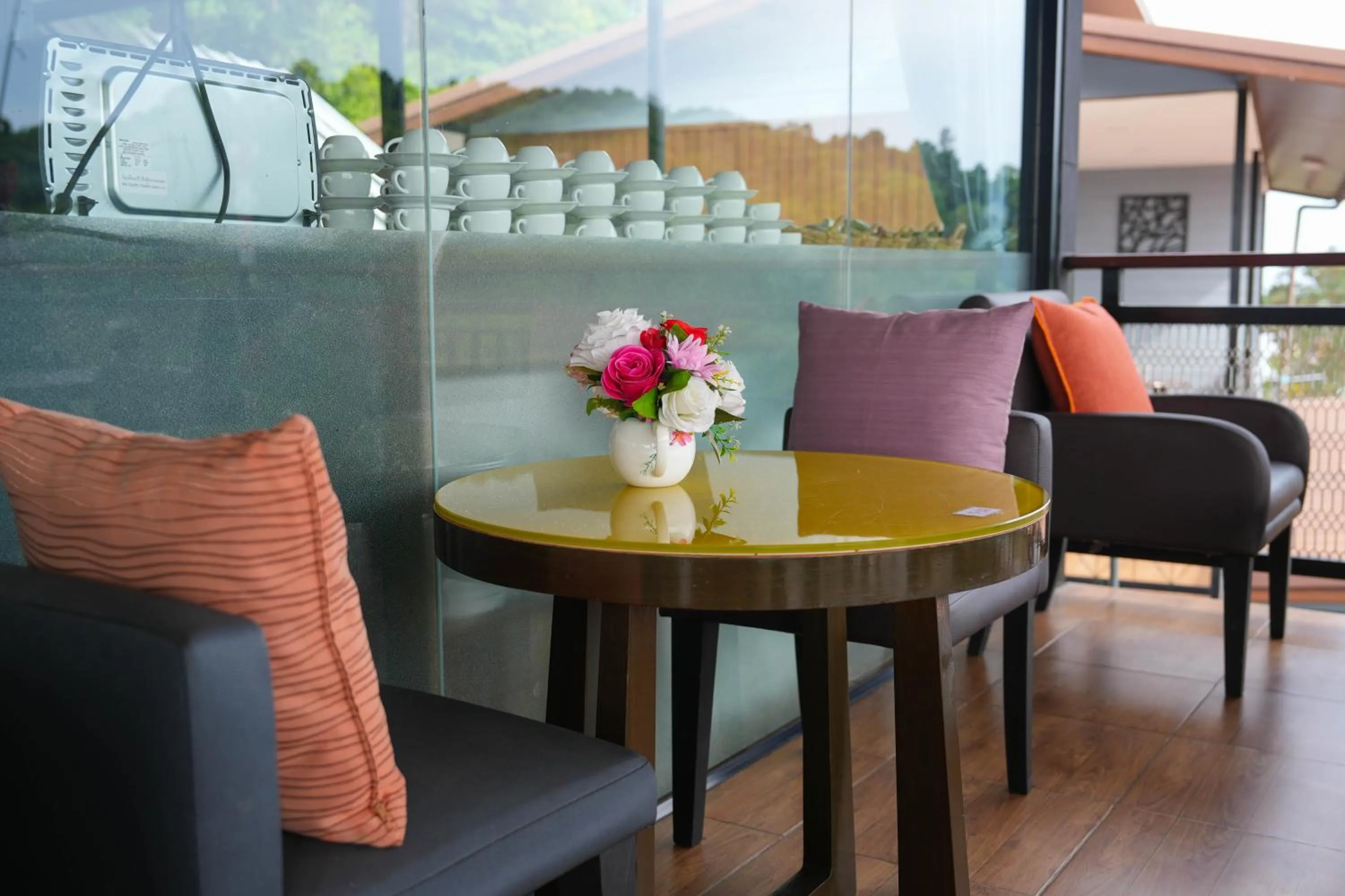 Seating area in So View Phuket Resort