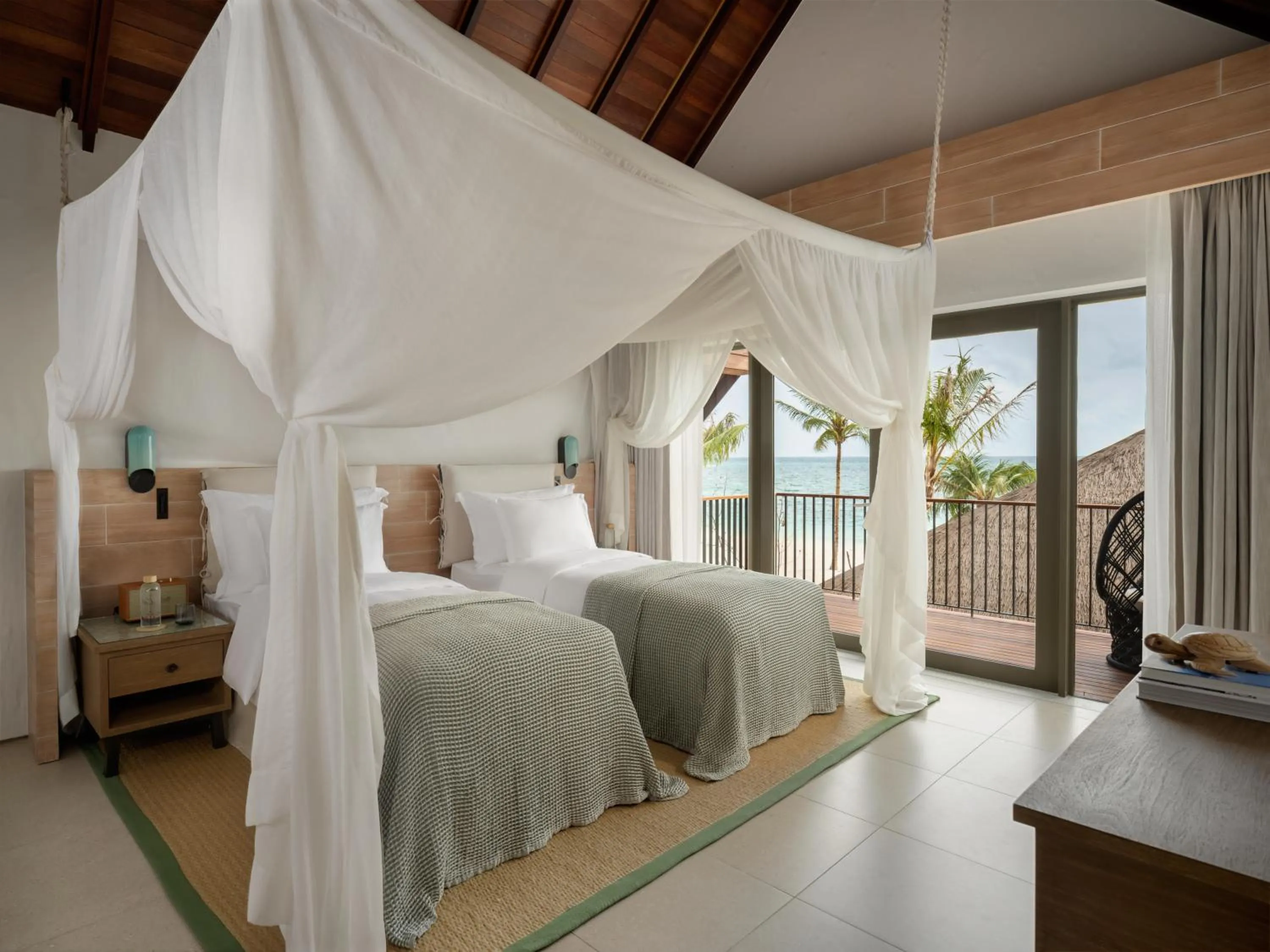 Bed in Six Senses Kanuhura