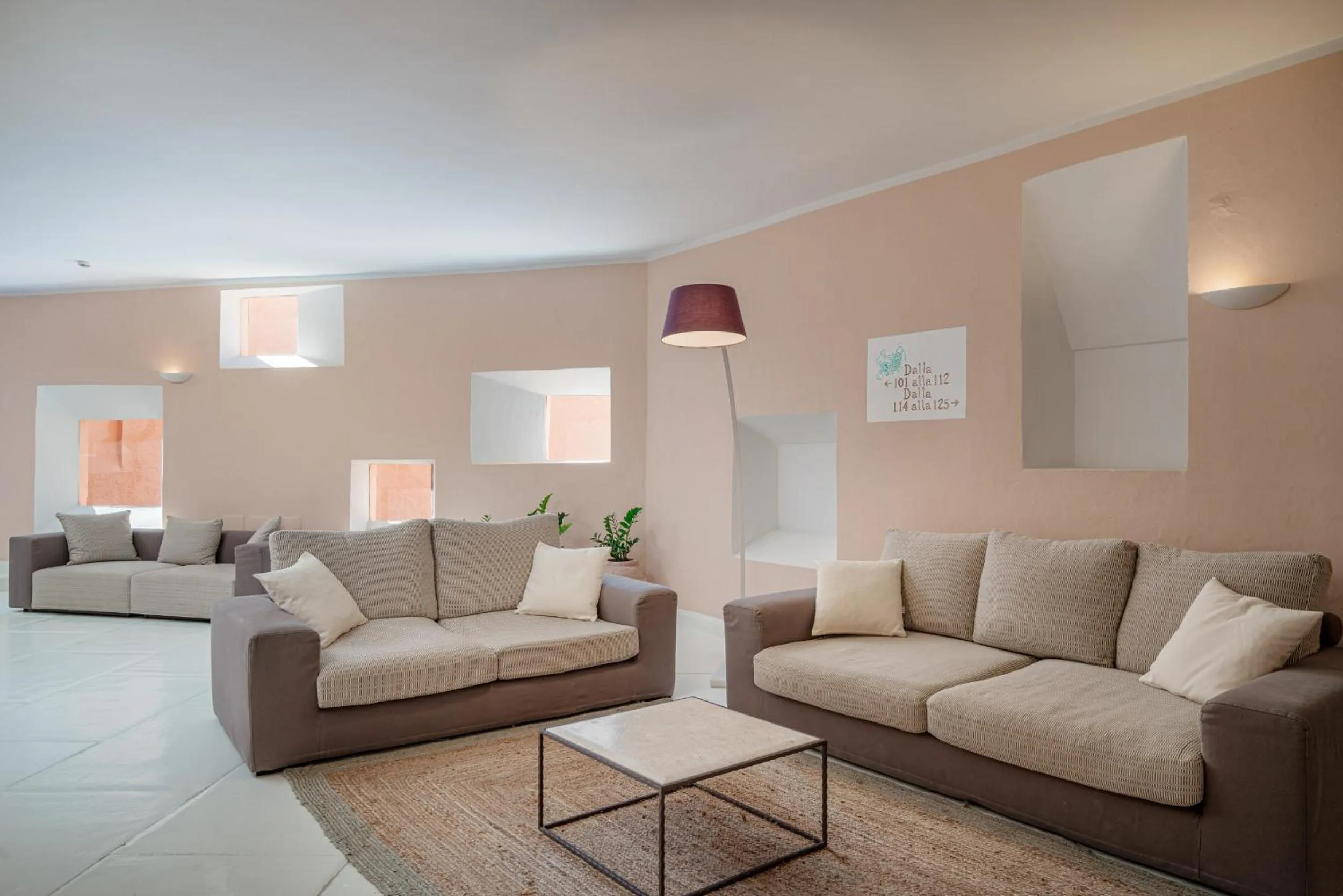 Communal lounge/ TV room in Hotel Cala Lunga