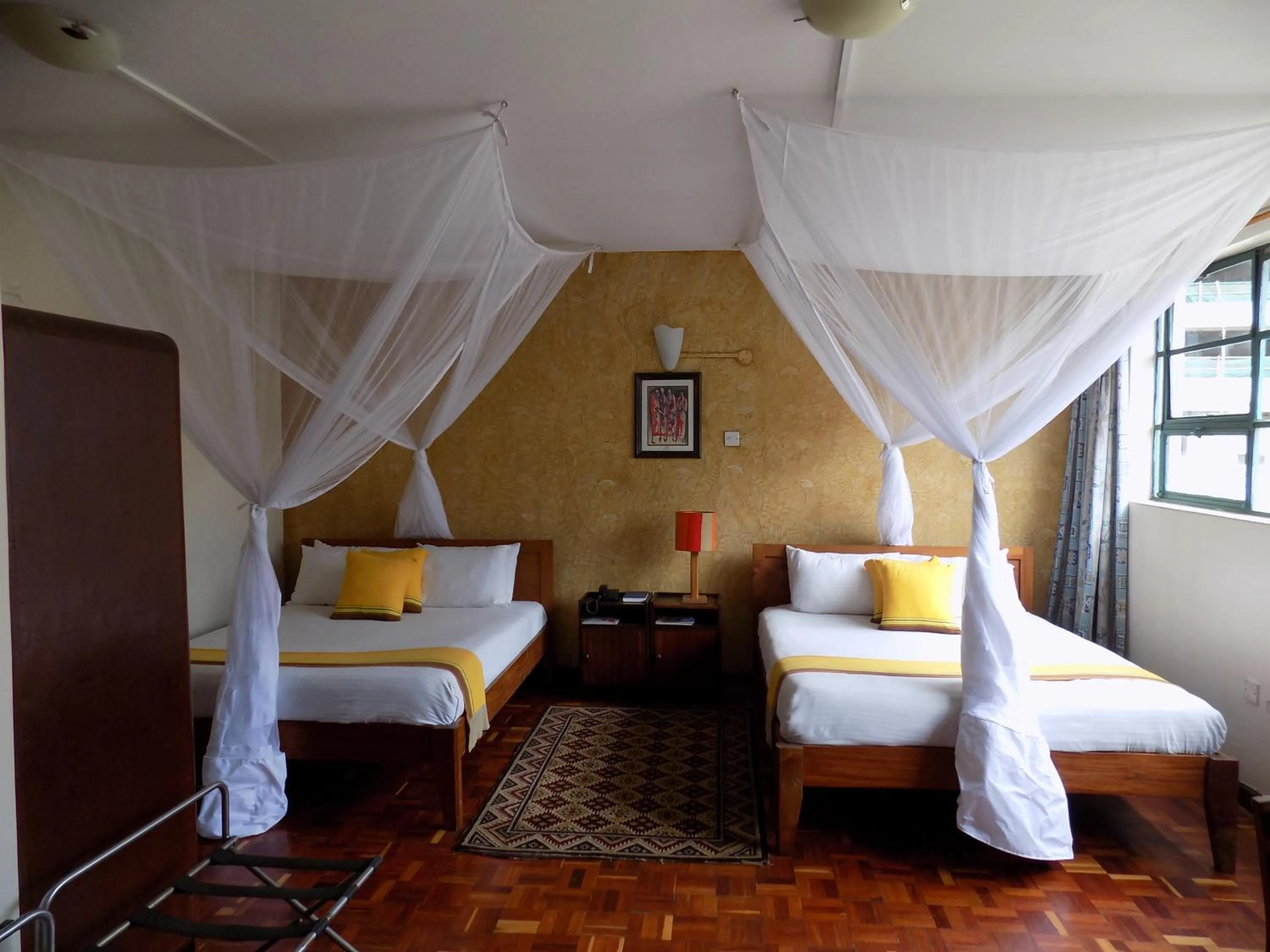 Photo of the whole room, Bed in Kenya Comfort Hotel