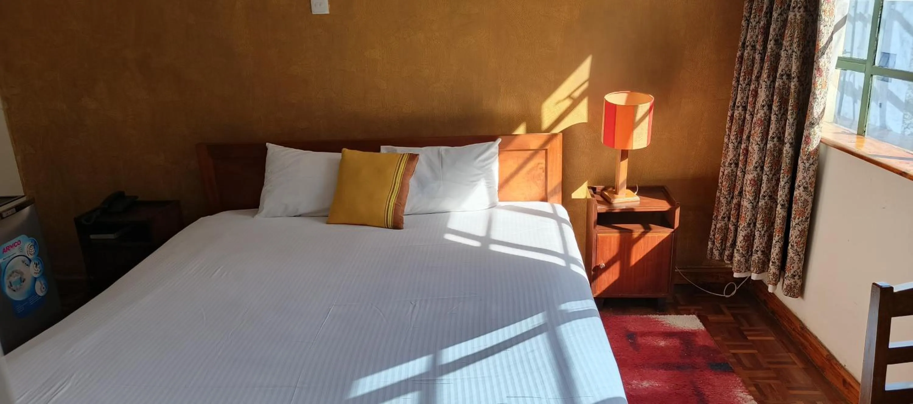 Bed in Kenya Comfort Hotel