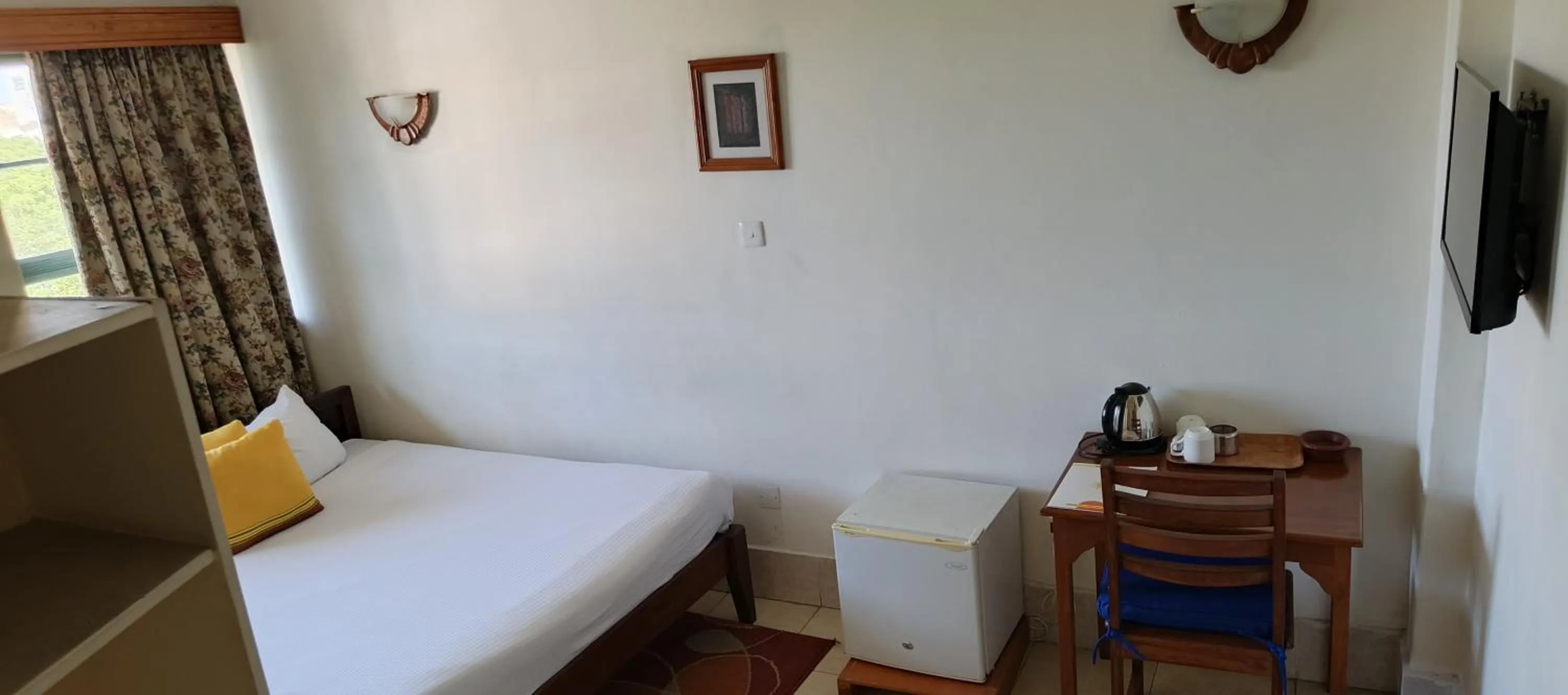 Bed in Kenya Comfort Hotel