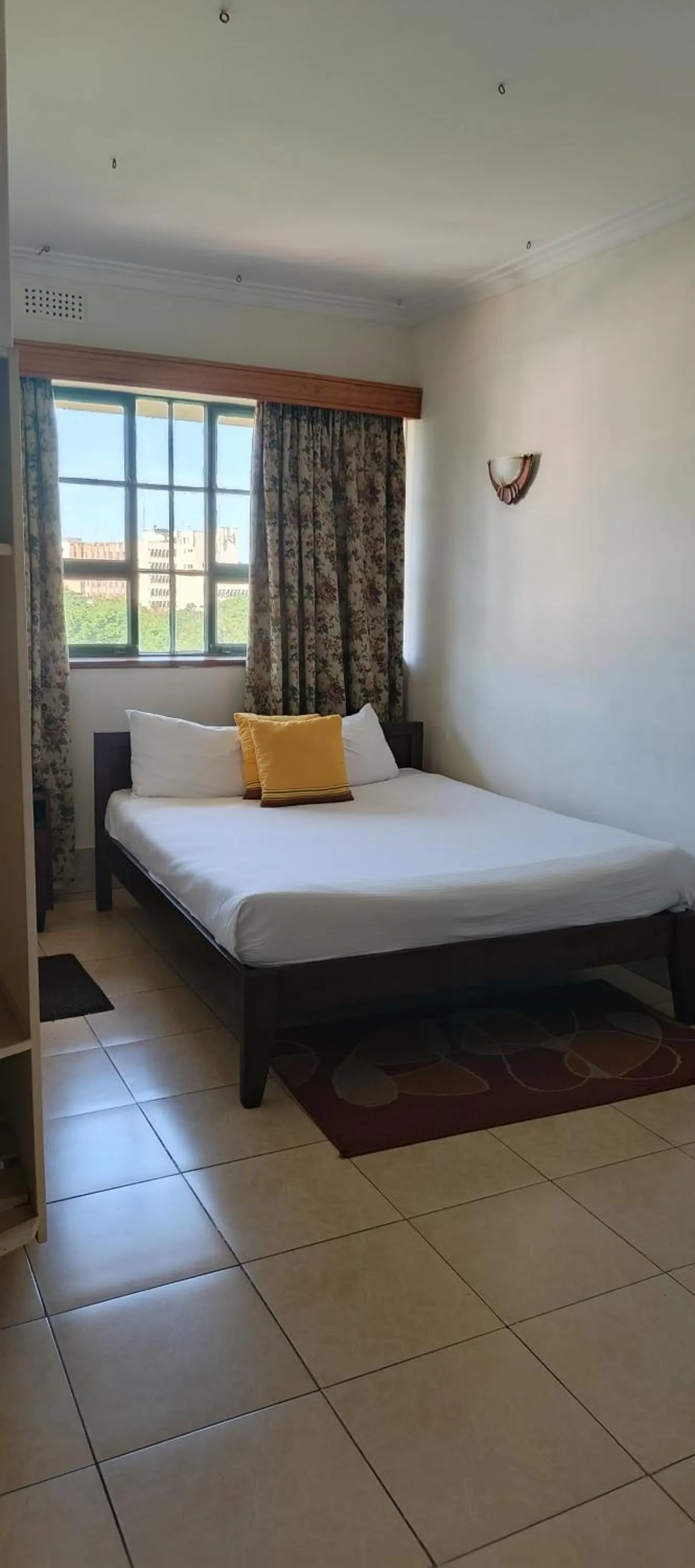 Bed in Kenya Comfort Hotel