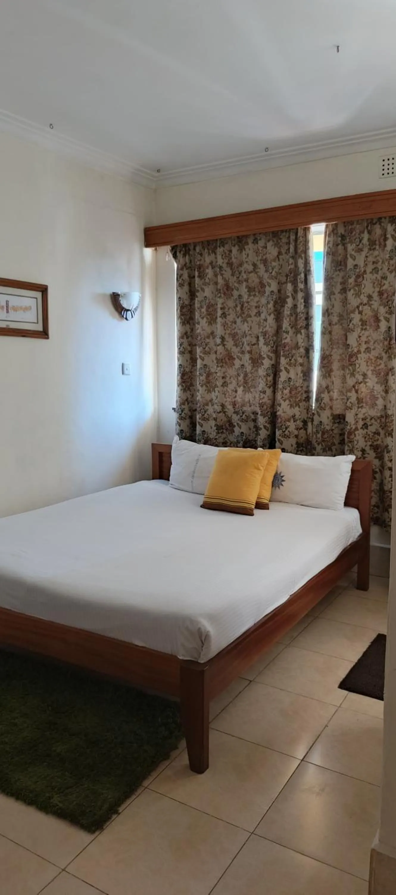 Bed in Kenya Comfort Hotel