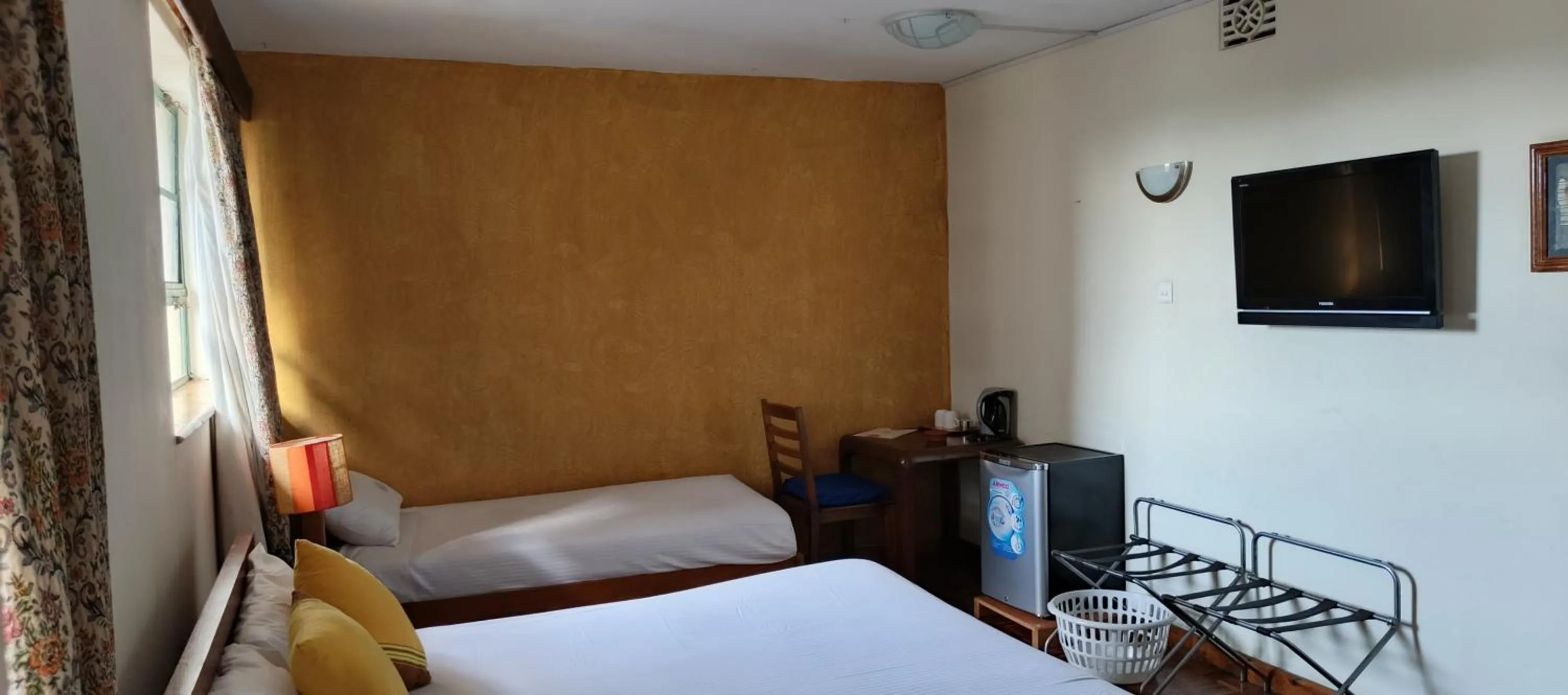 Bed in Kenya Comfort Hotel