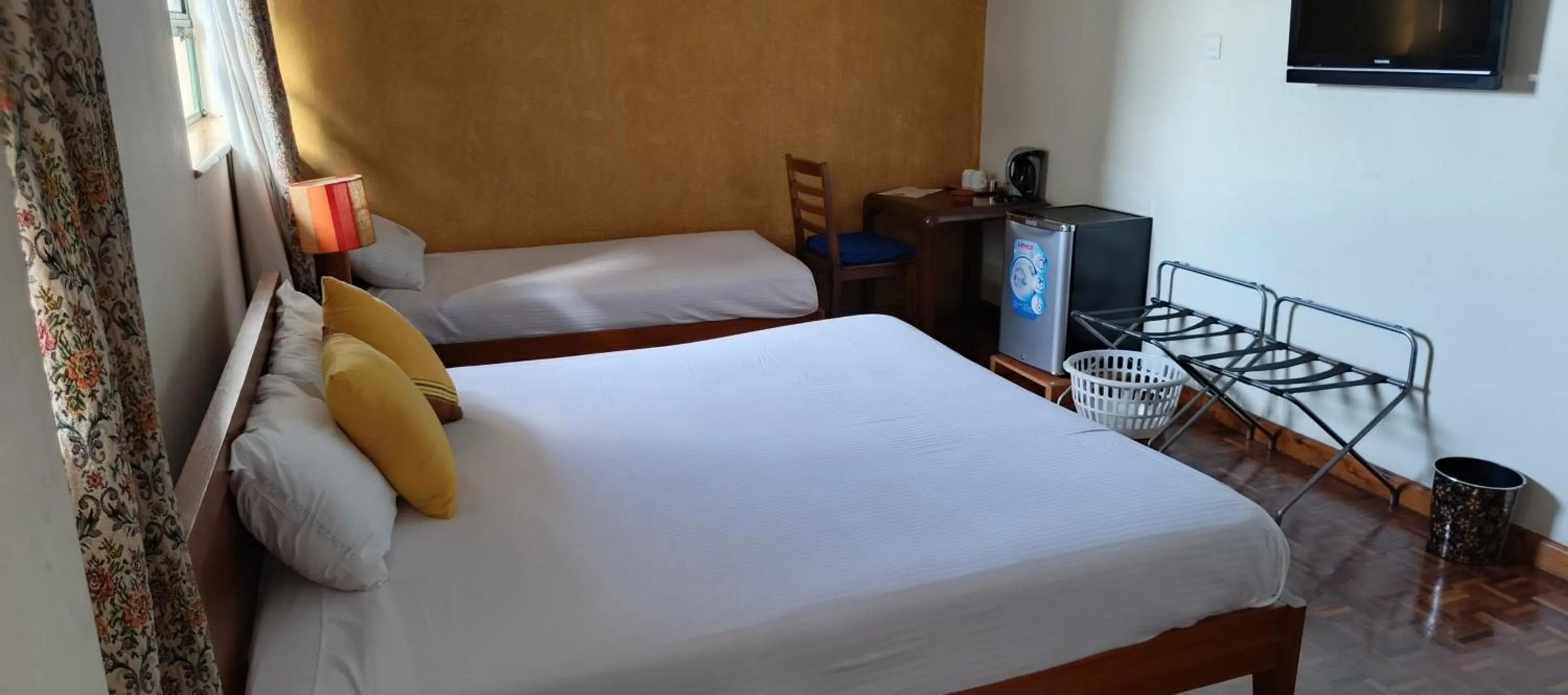 Bed in Kenya Comfort Hotel