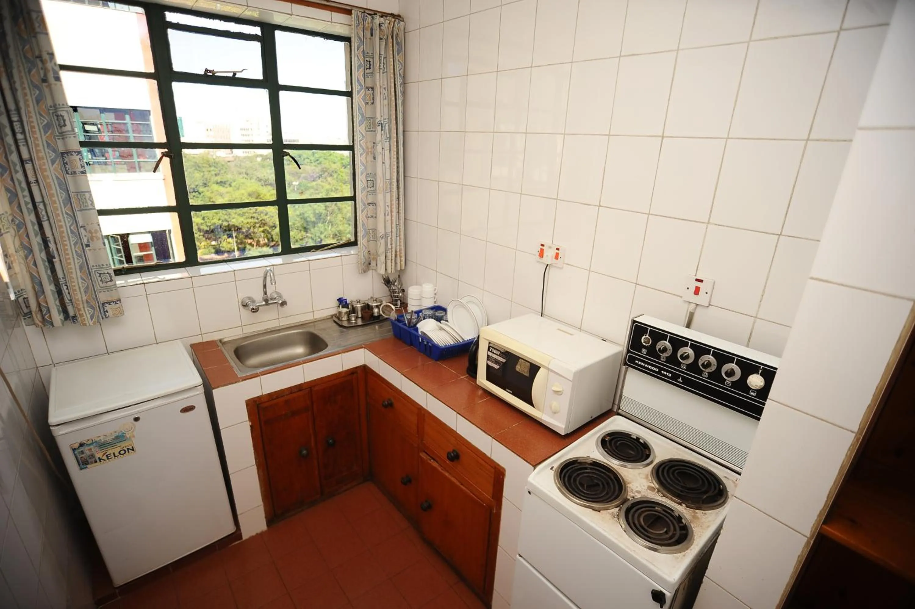 Kitchen or kitchenette in Kenya Comfort Hotel