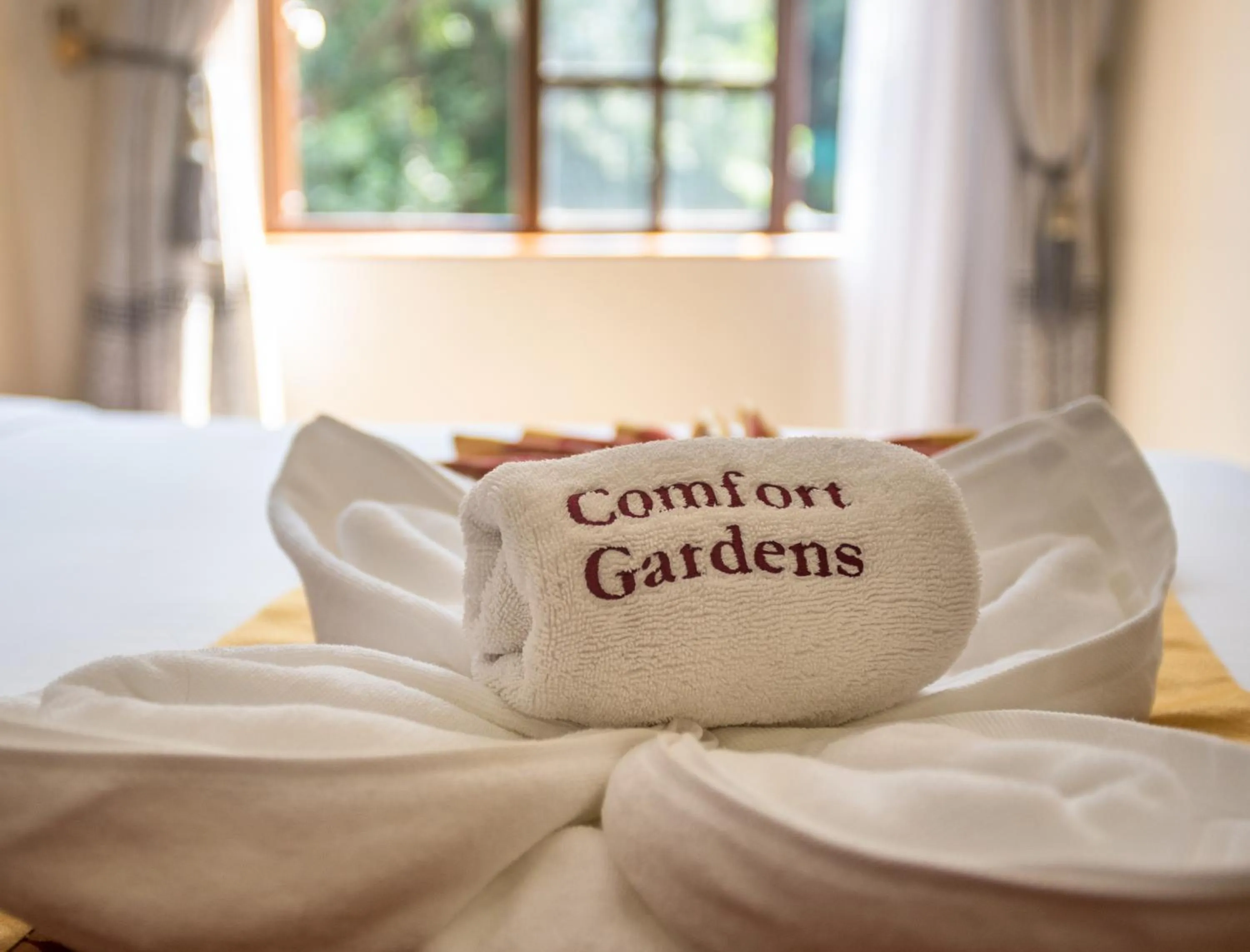 towels, Bed in Comfort Gardens
