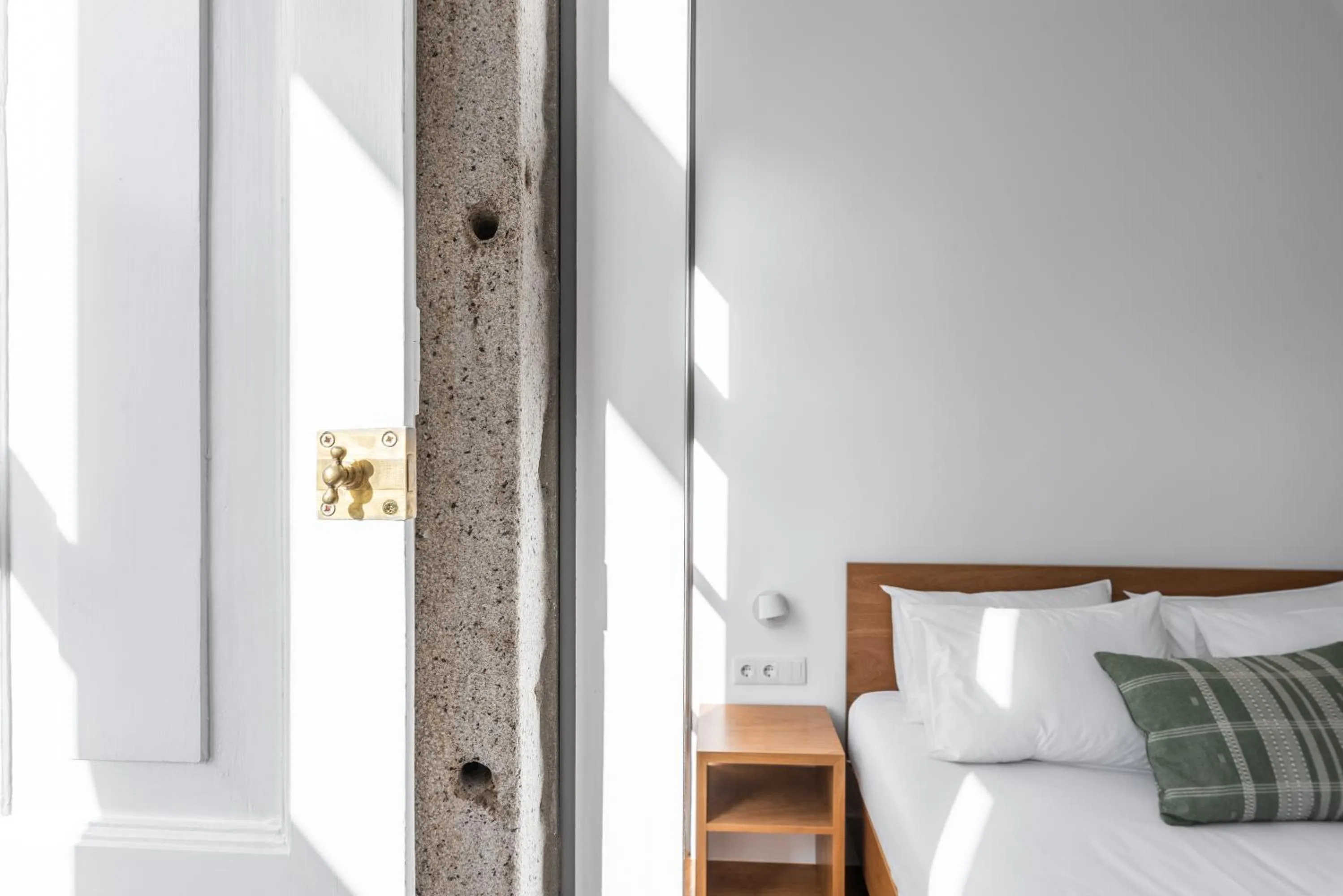 Decorative detail, Bed in Avenida Viana Boutique Suites