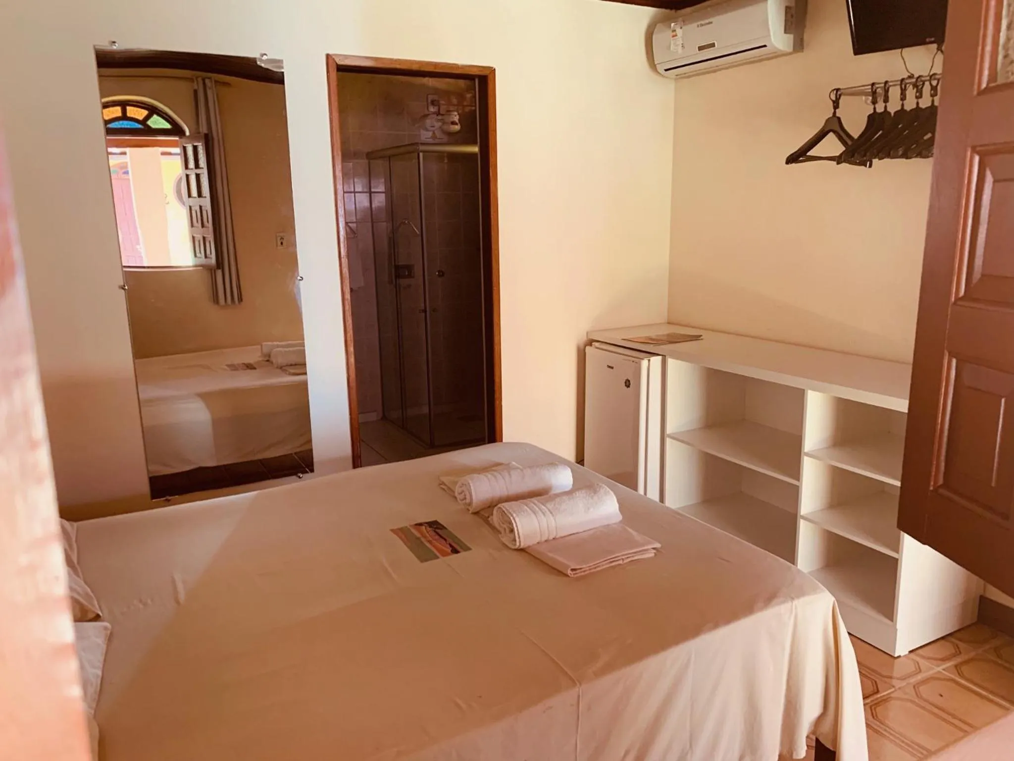 Photo of the whole room, Bed in Pousada Paradise