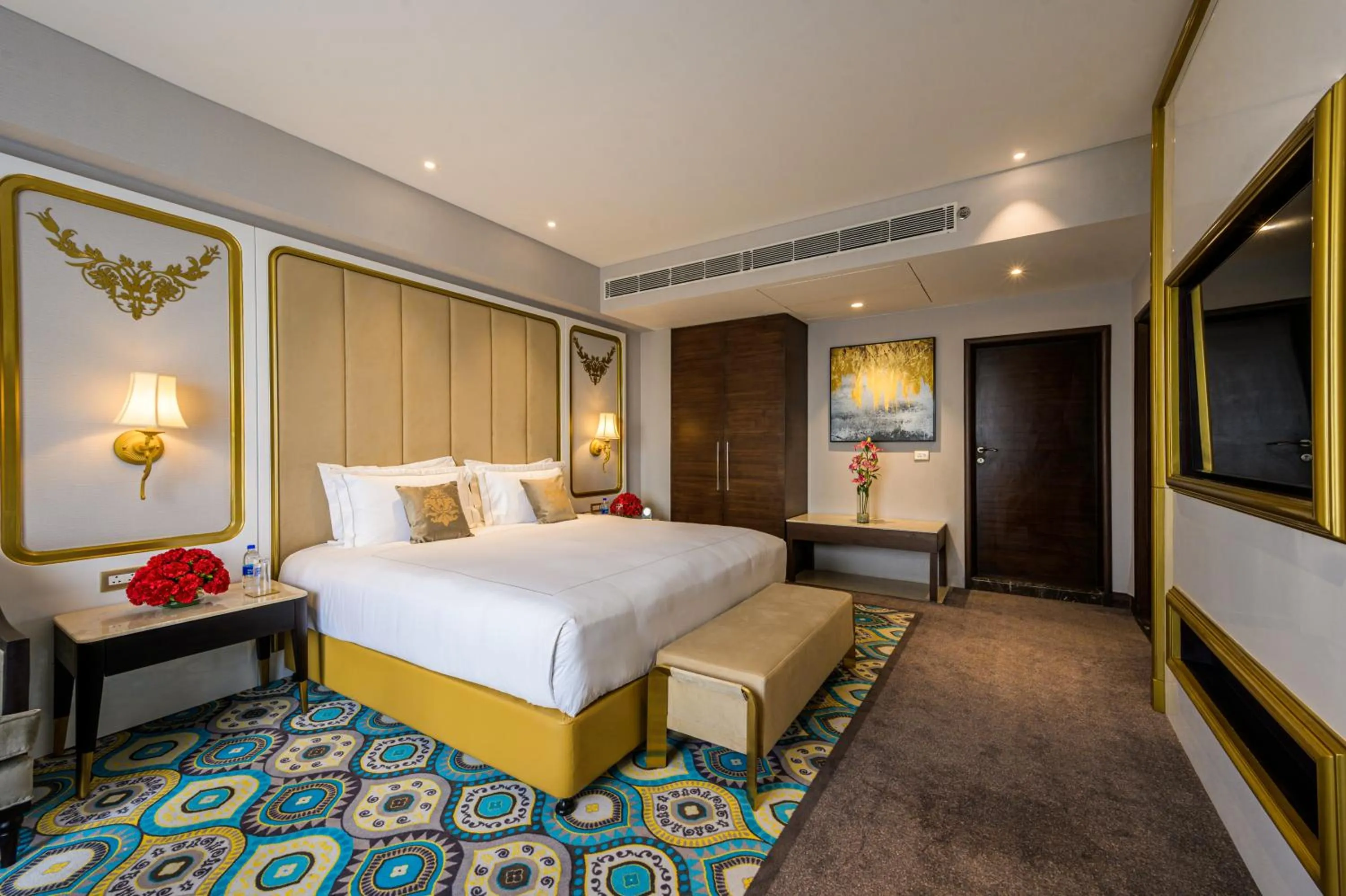 Bed in Taj Gandhinagar Resort and Spa