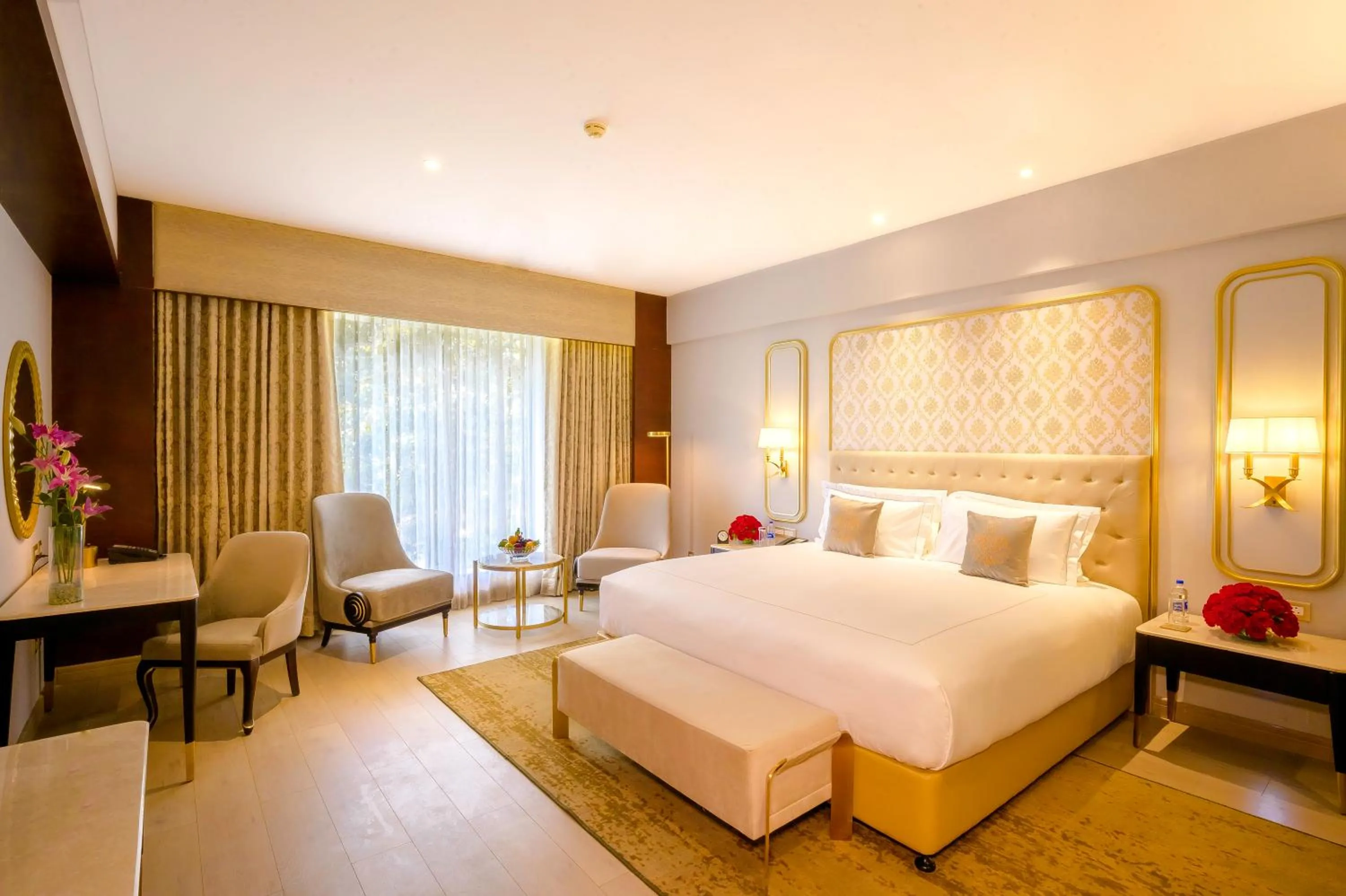 Bed in Taj Gandhinagar Resort and Spa