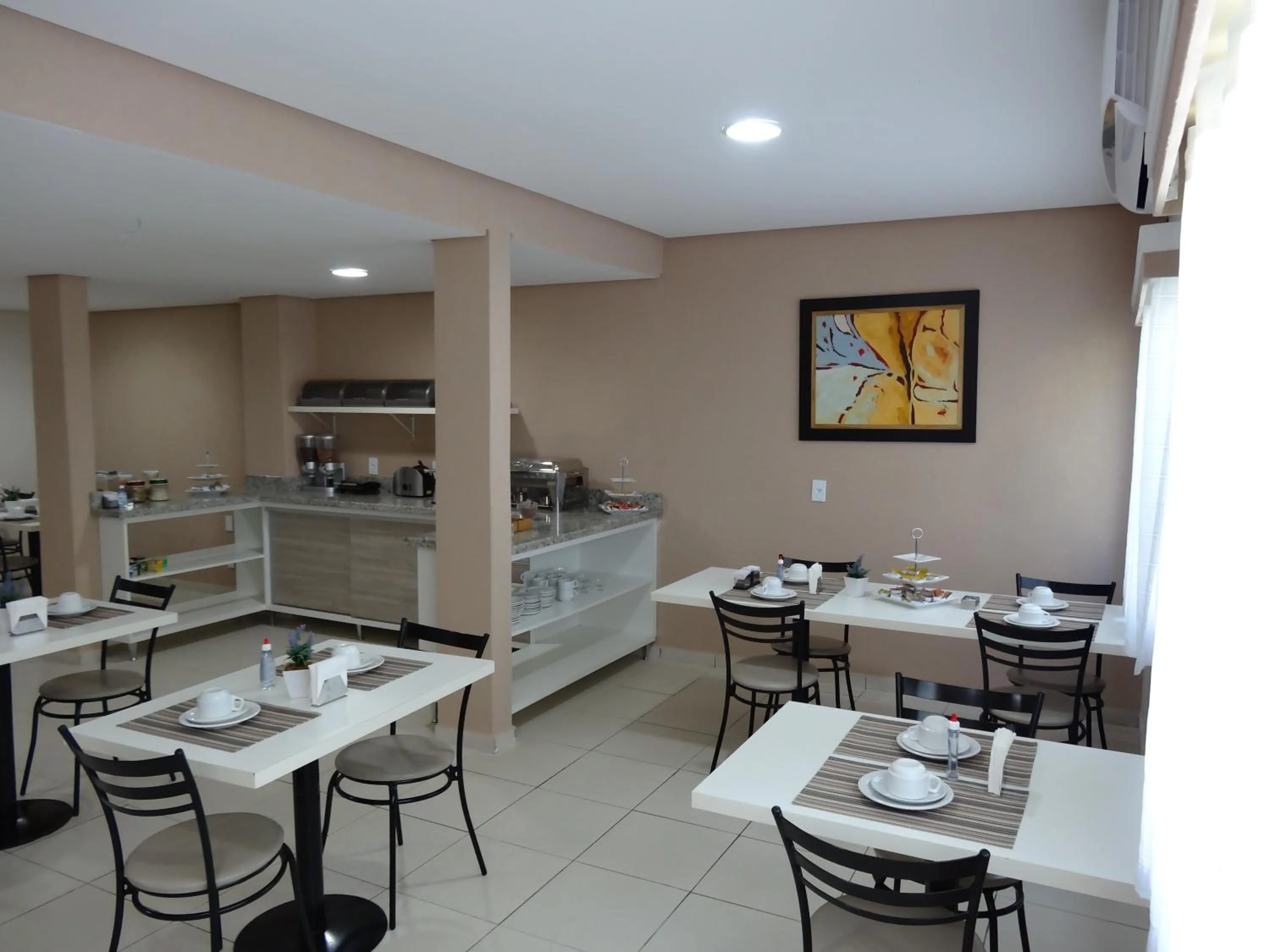 Dining area in Cerrado Hotel LTDA