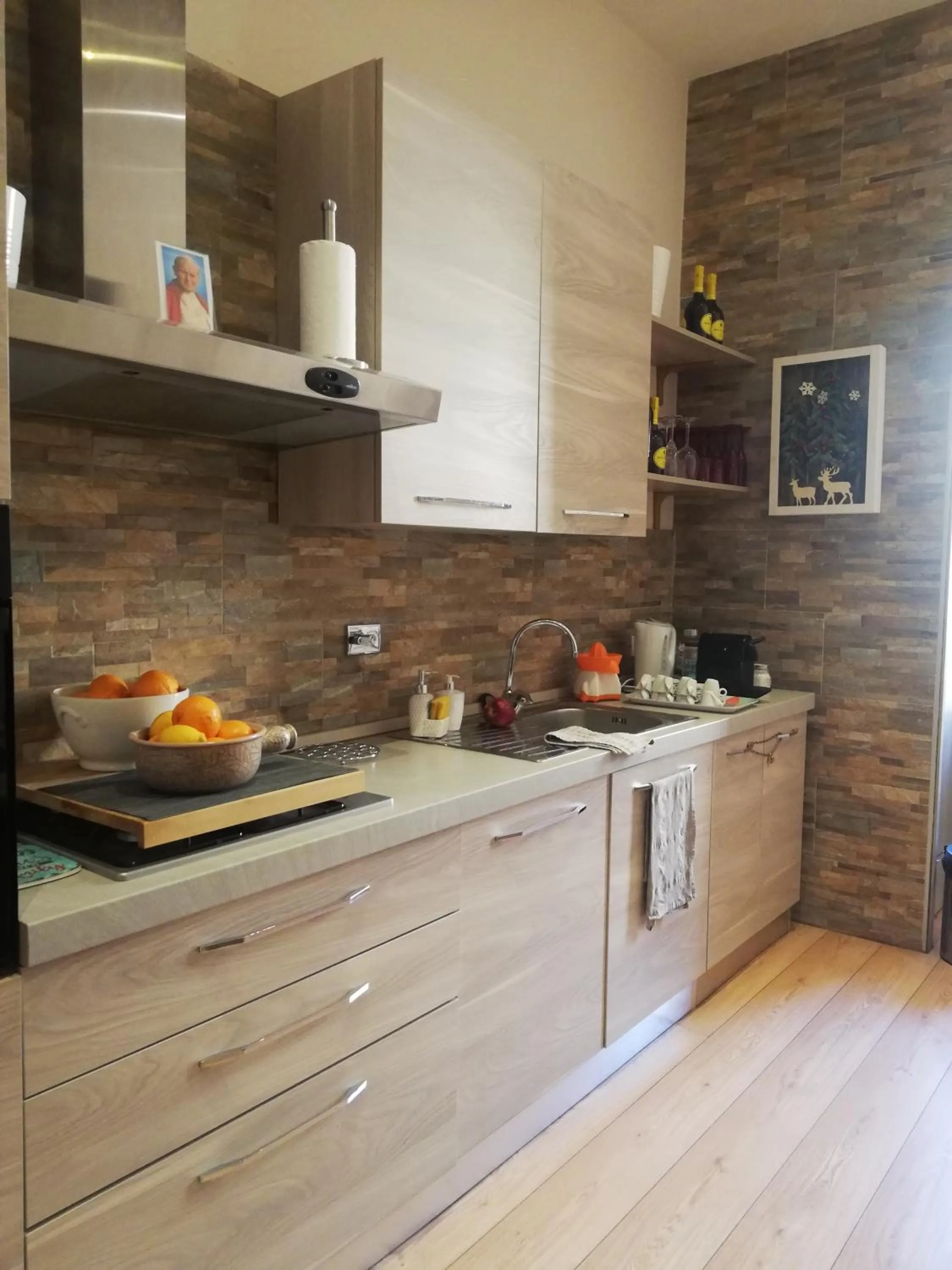 Kitchen or kitchenette in Aria Rome Rooms