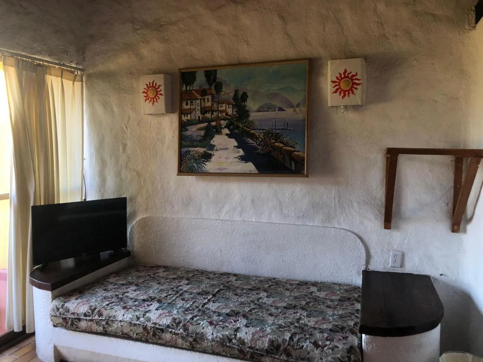 Photo of the whole room, TV/Entertainment Center in hotel plaza tucanes