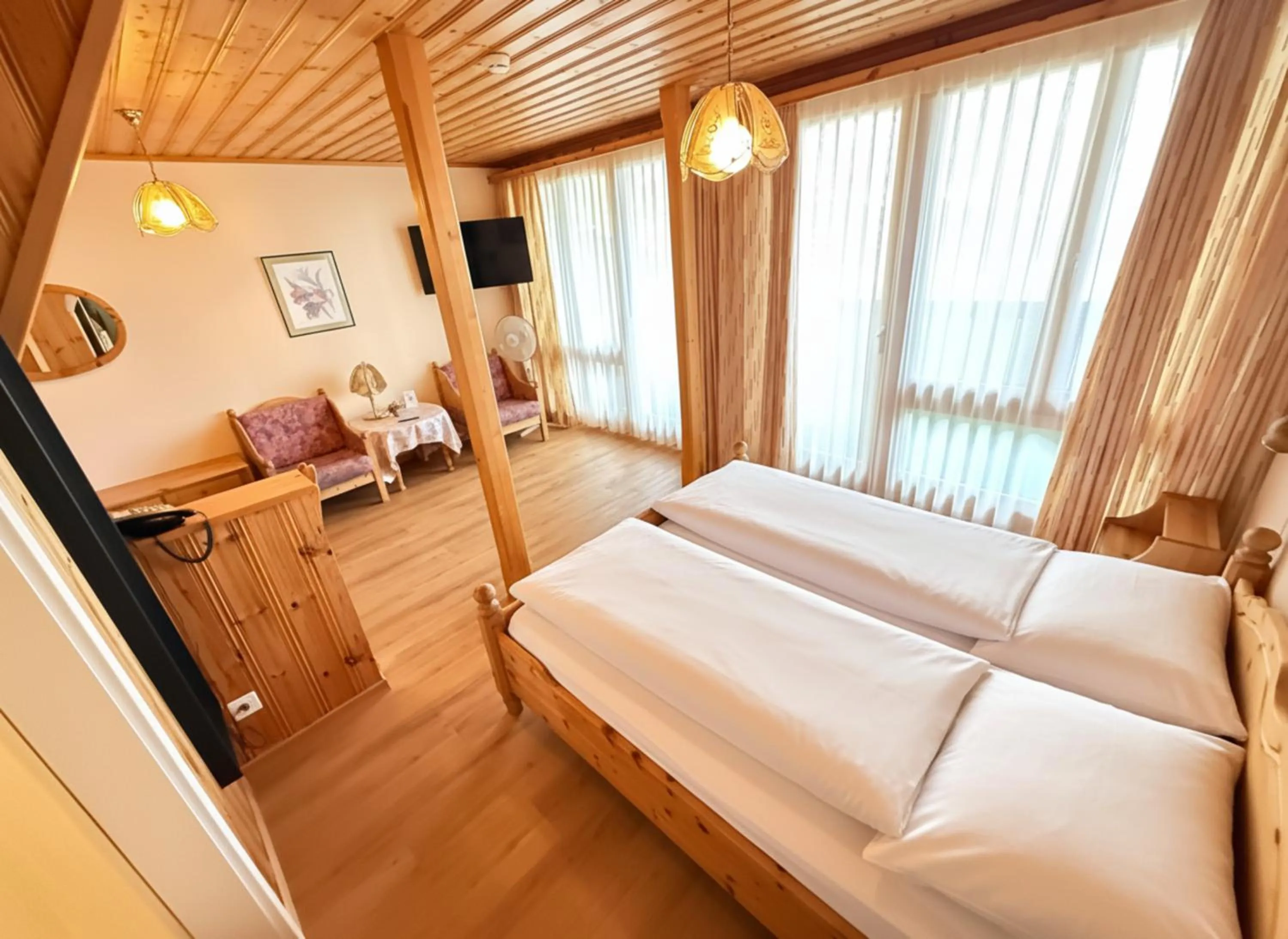 Bedroom, Bed in Beatenberg Resort & Spa in Beatenberg Interlaken