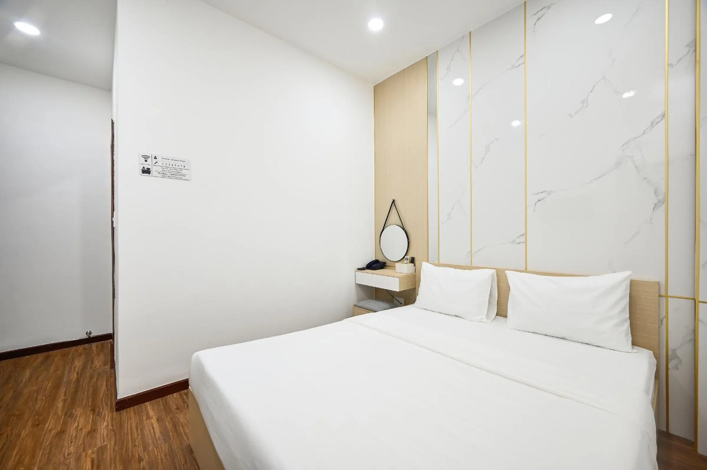 Bed in Sunrise Airport Hotel