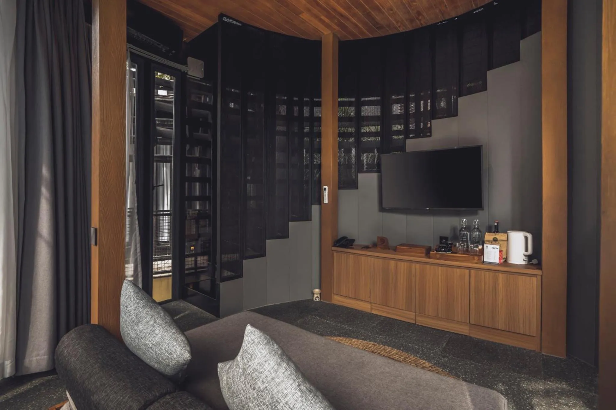 Living room in Canggu Cabana Beach Resort by Ini Vie Hospitality