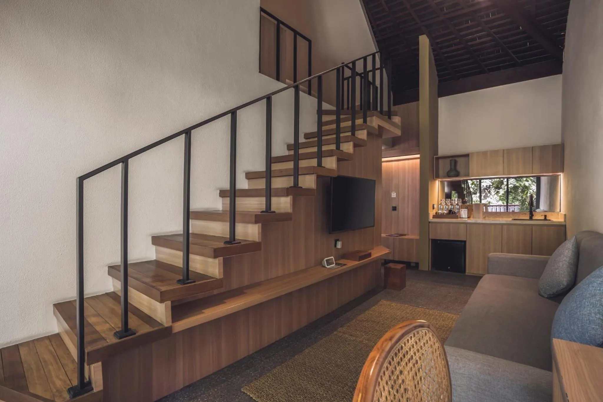 Living room in Canggu Cabana Beach Resort by Ini Vie Hospitality