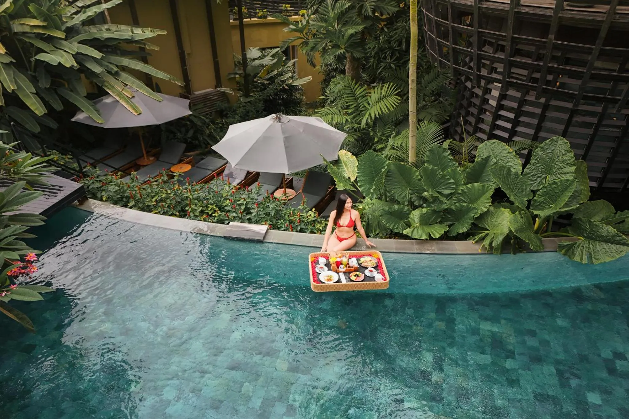 Swimming pool in Canggu Cabana Resort & Spa by Ini Vie Hospitality