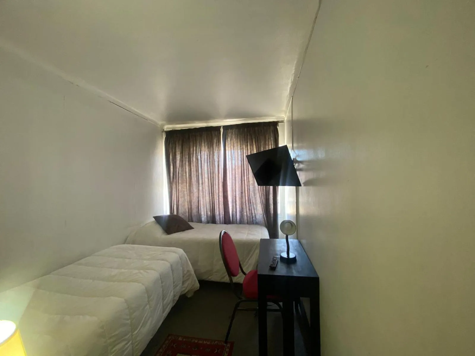 Photo of the whole room, Bed in NEW HOTEL CRUZ DEL SUR