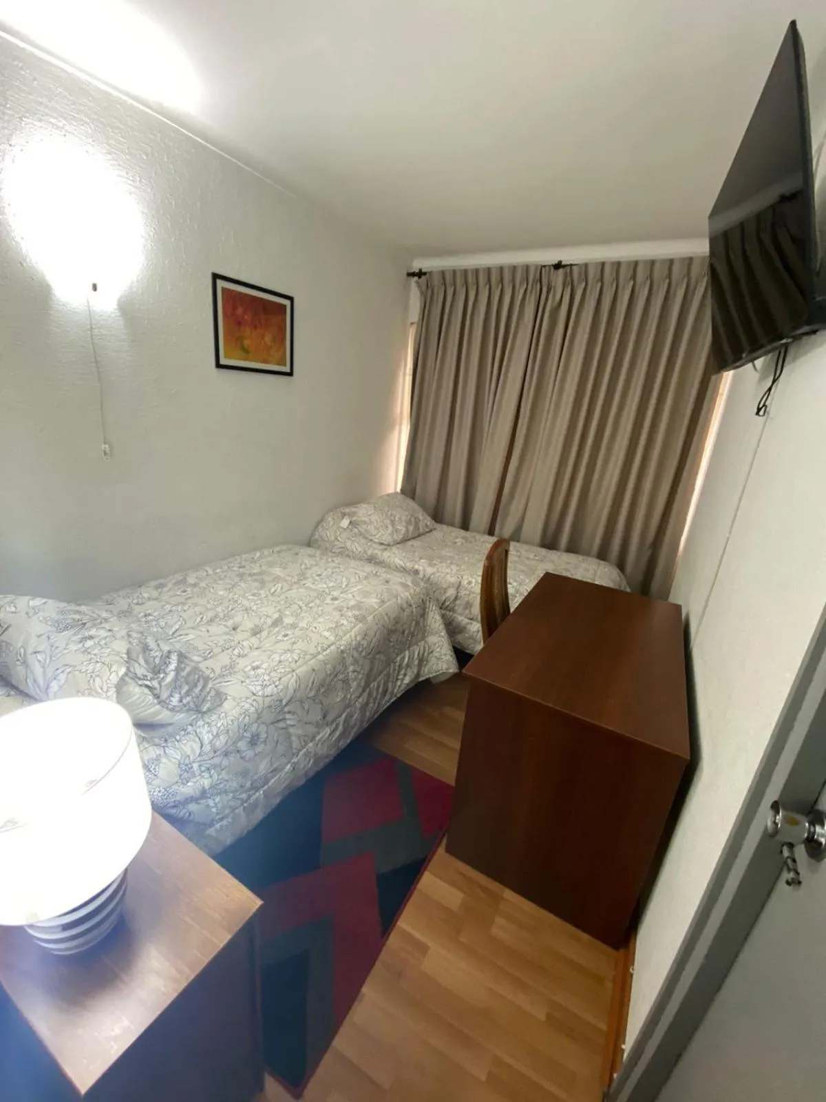 Bed in NEW HOTEL CRUZ DEL SUR