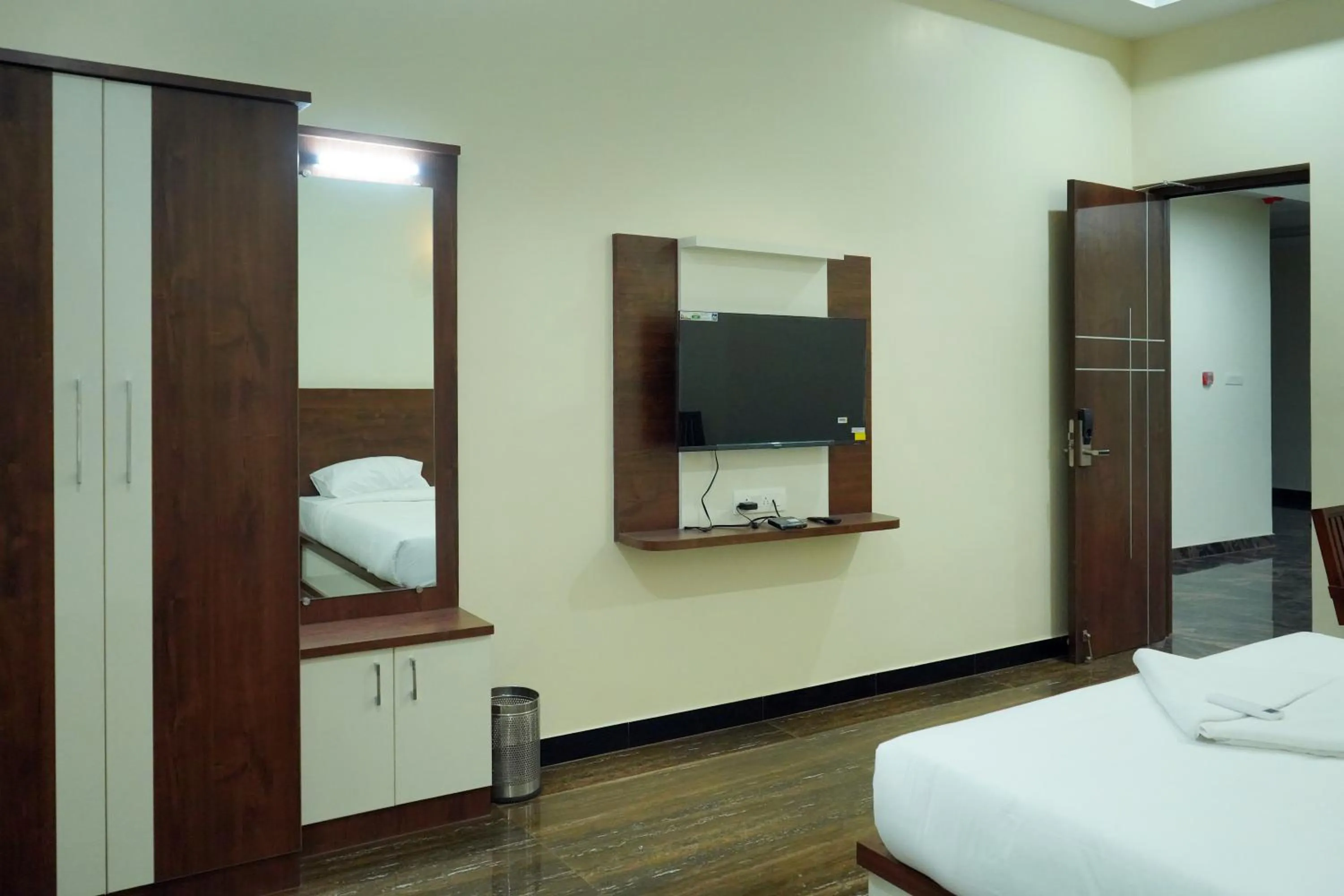 Bed in HOTEL NIVETHA INN