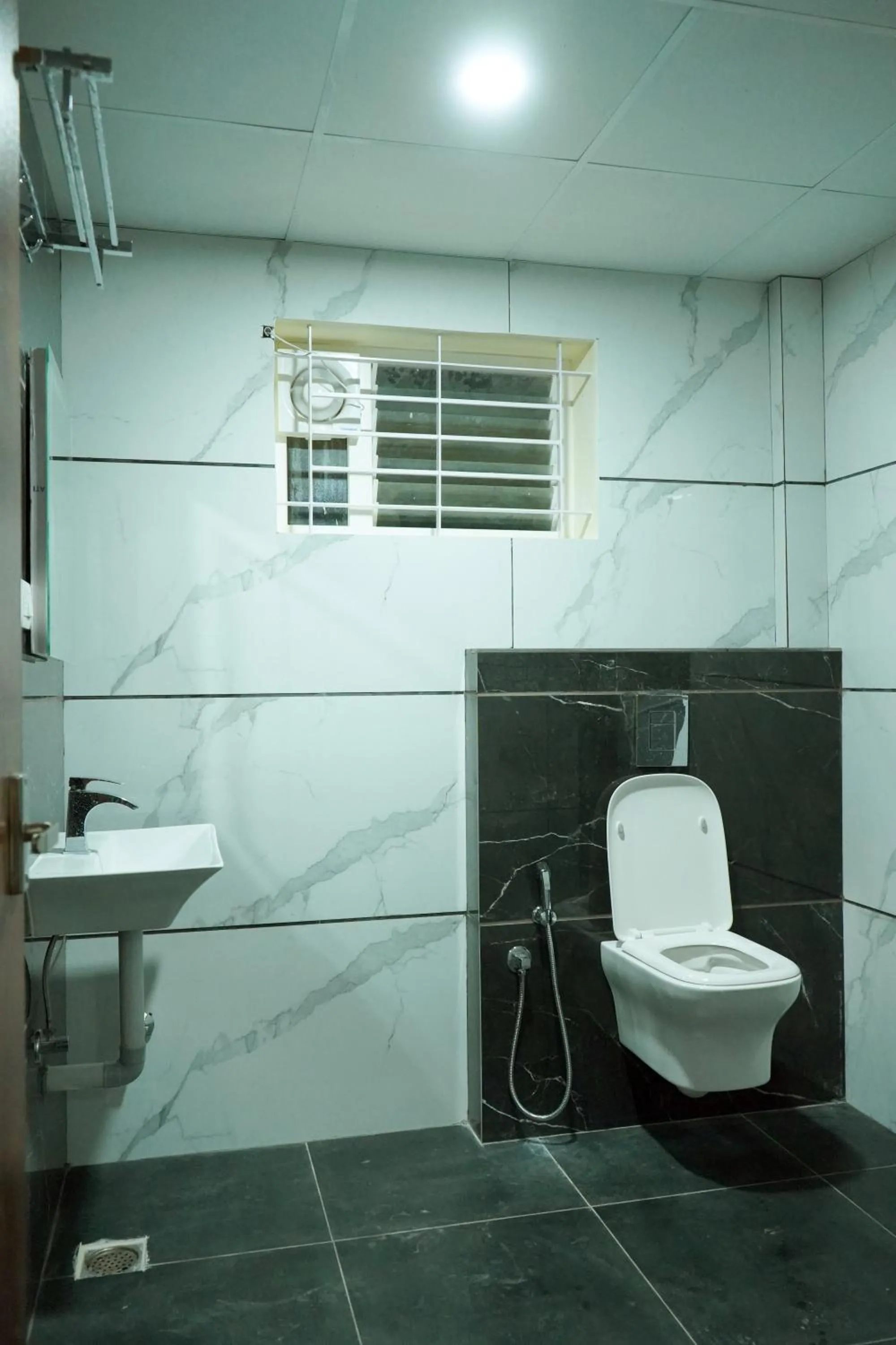 Bathroom in HOTEL NIVETHA INN