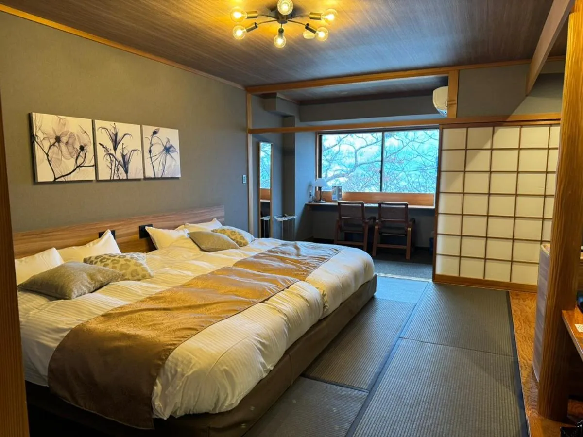 Photo of the whole room, Bed in Towadakohan Sakura