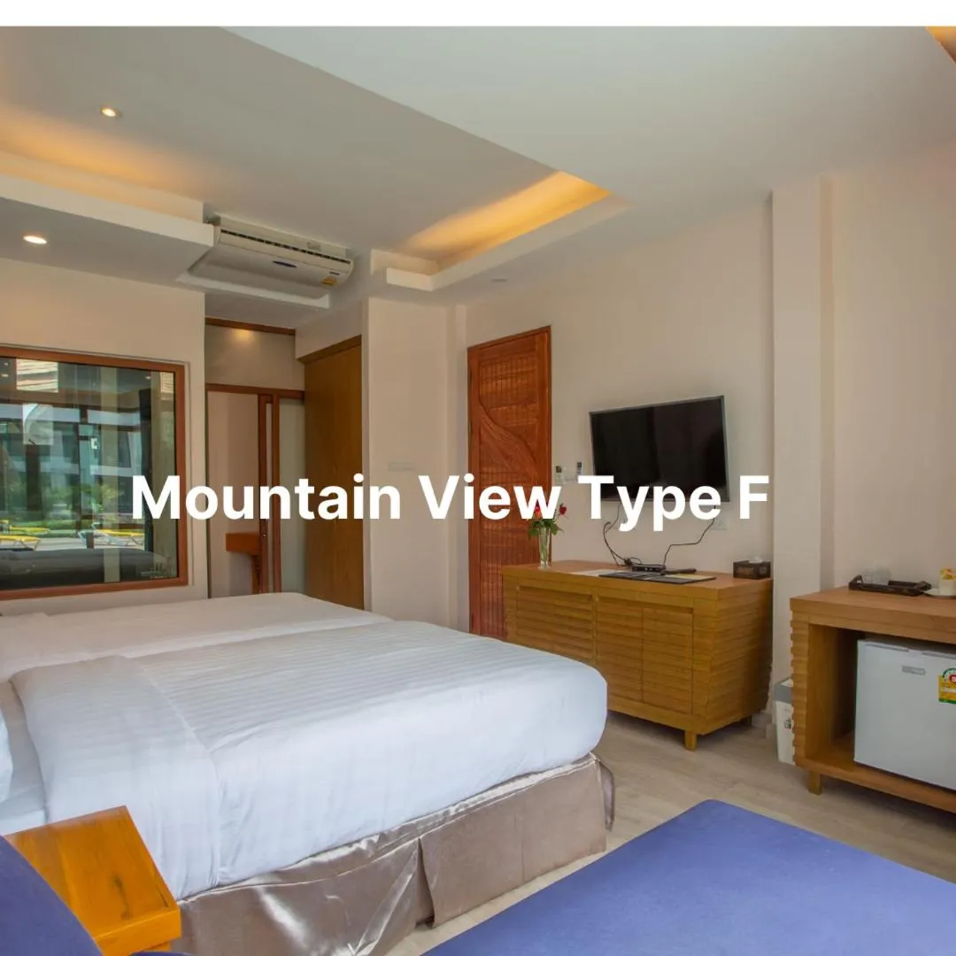 Bed in Nakaburi Sanctuary Resort&Spa