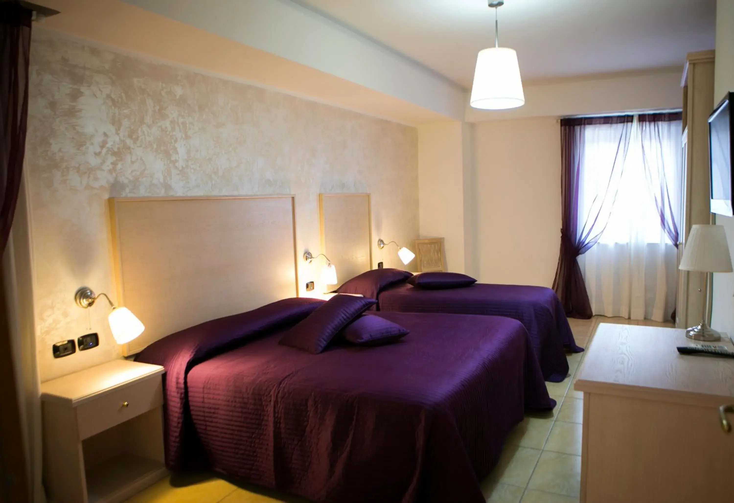Triple Room - single occupancy in Hotel Miramare Triple Room - single occupancy in Hotel Miramare