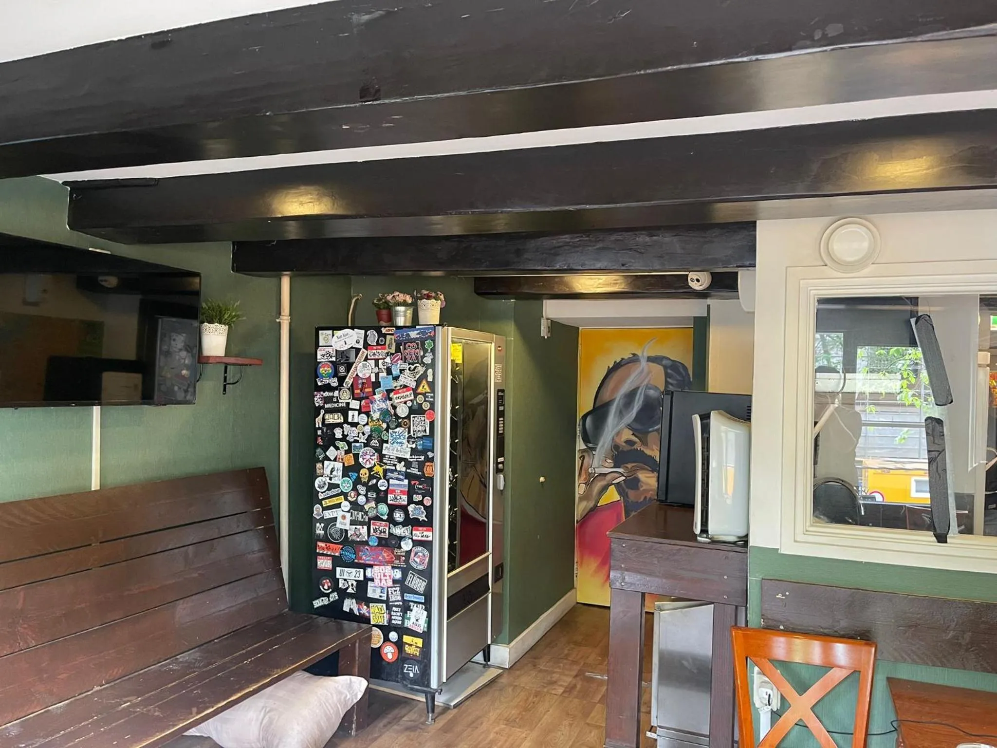 Communal lounge/ TV room in International Budget Hostel City Center