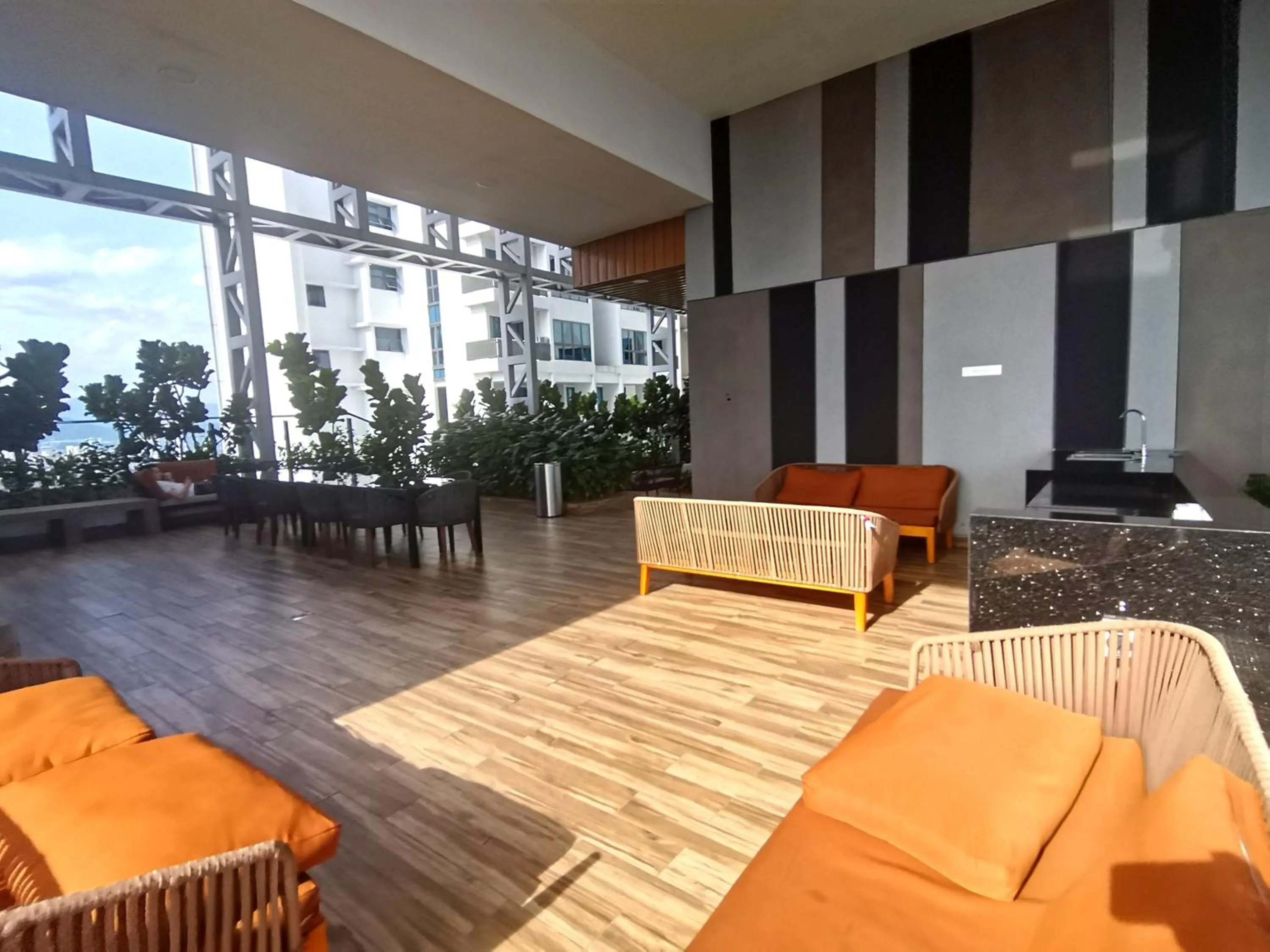 Communal lounge/ TV room in LUXE Infinitum KLCC by WSD