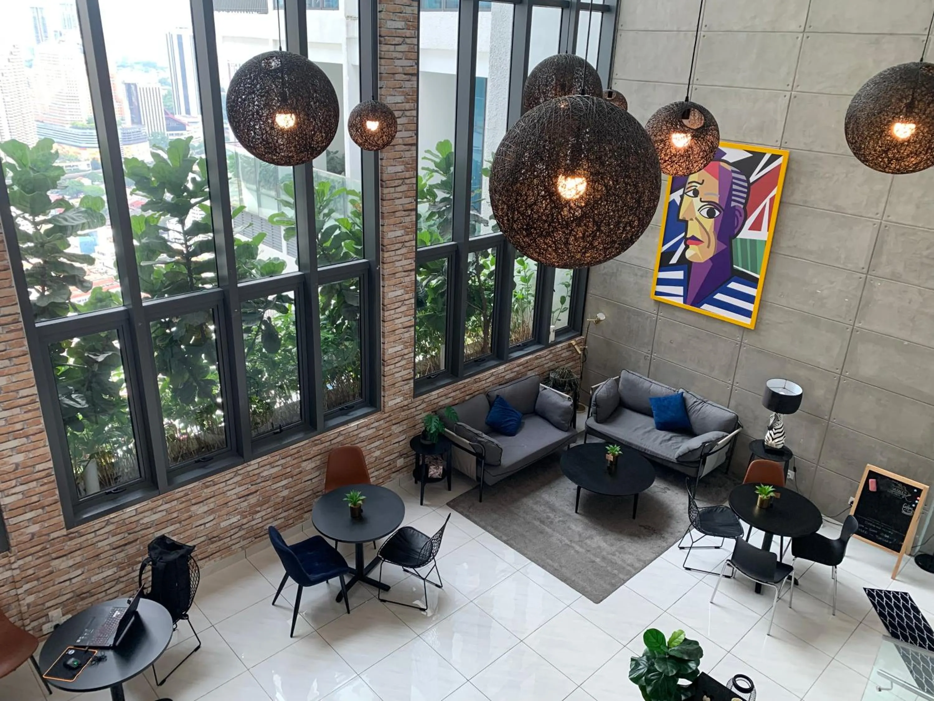 Communal lounge/ TV room in LUXE Infinitum KLCC by WSD