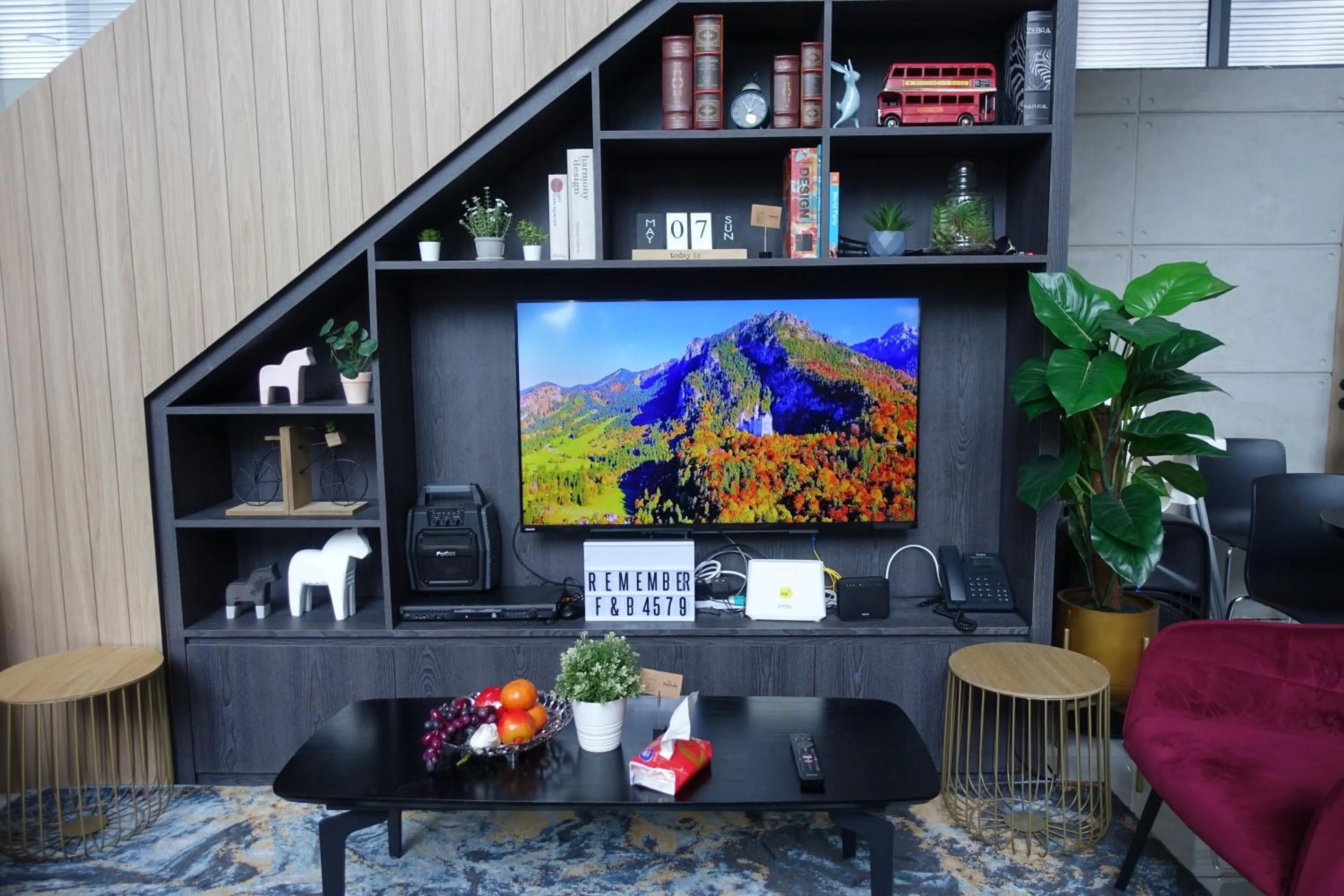 Communal lounge/ TV room in LUXE Infinitum KLCC by WSD