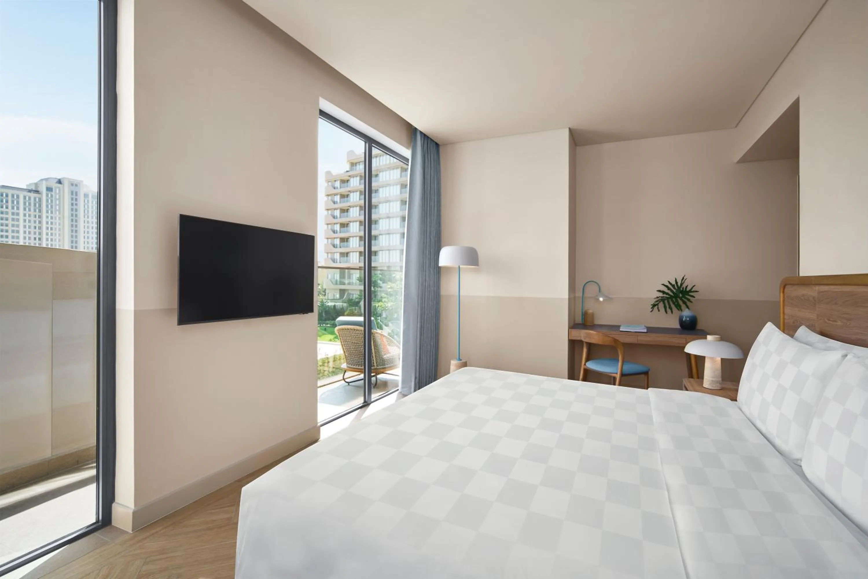 Communal lounge/ TV room, Bed in IXORA Ho Tram By Fusion