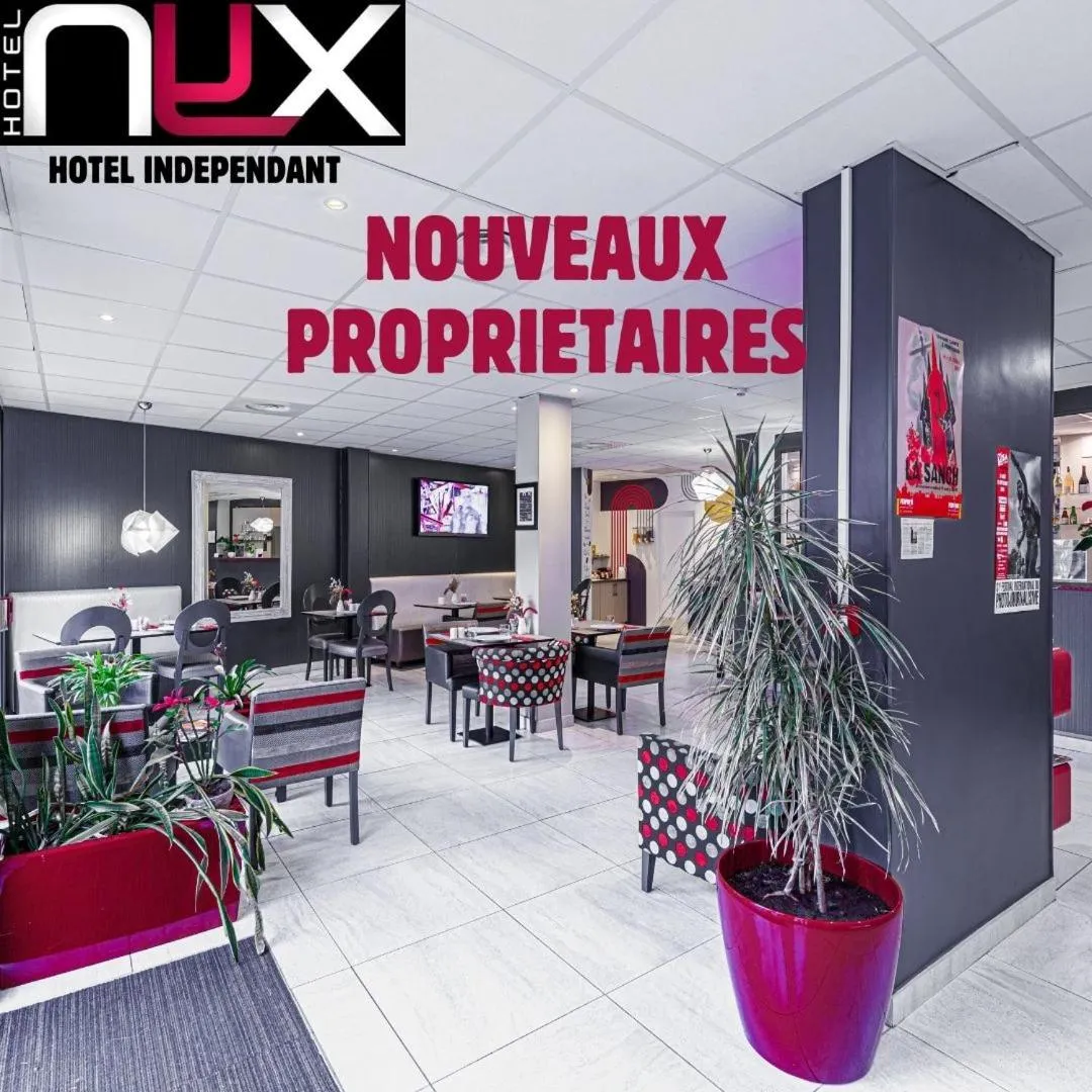 Communal lounge/ TV room in Nyx Hôtel Indépendant Perpignan Centre Gare