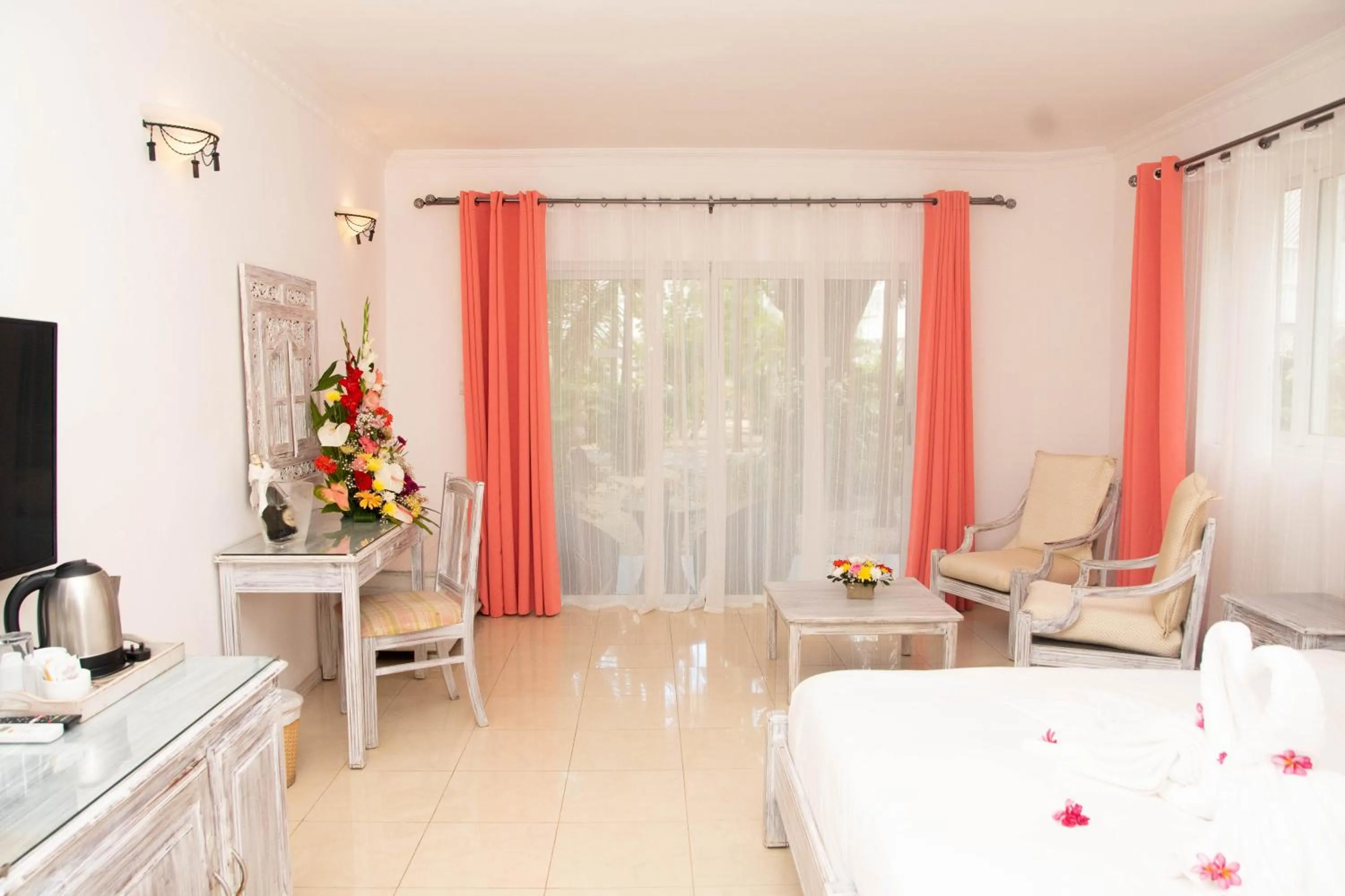 Bed in Hibiscus Boutique Hotel