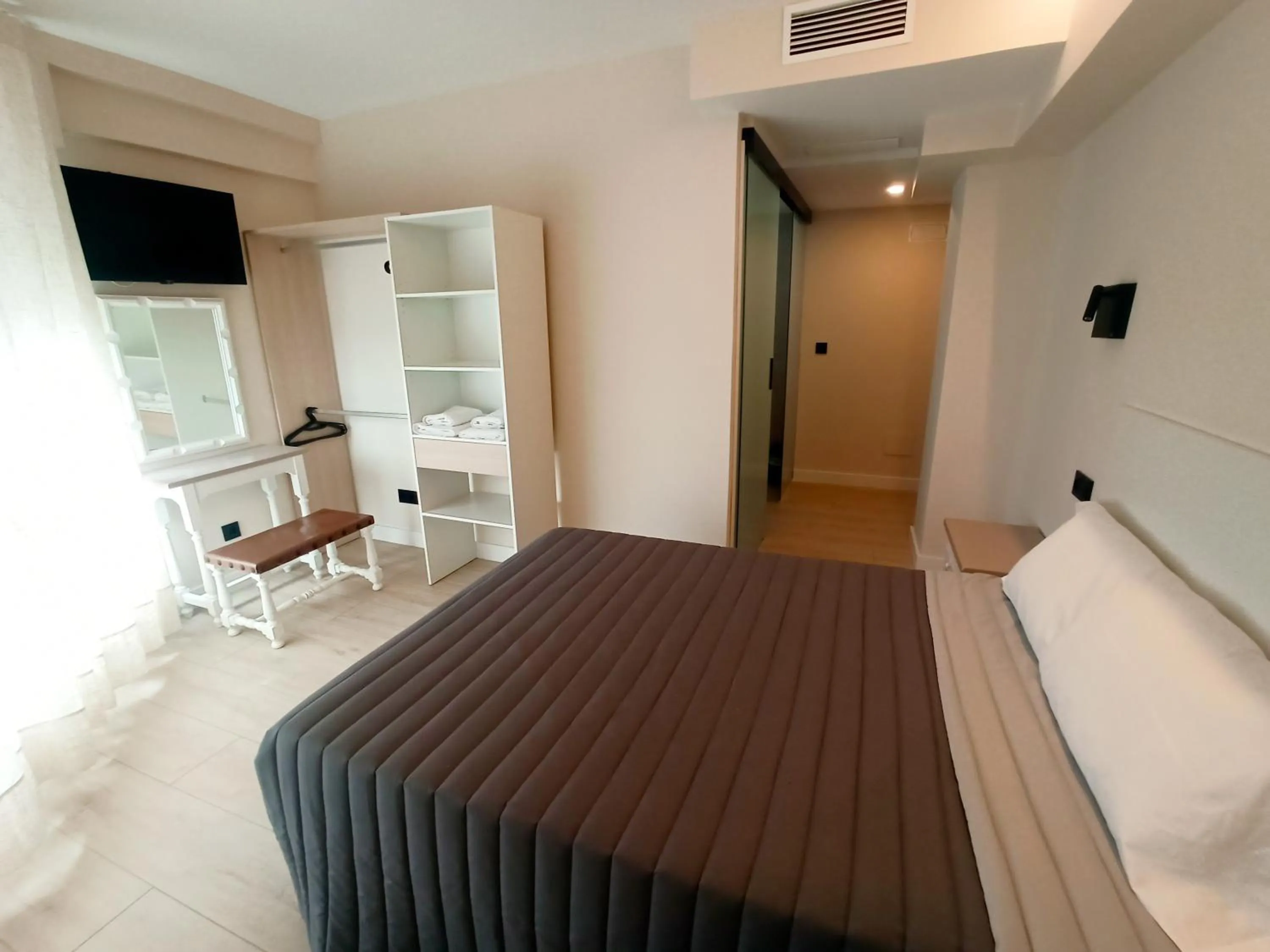 Bed in Bahia Rooms Cantabria 3000