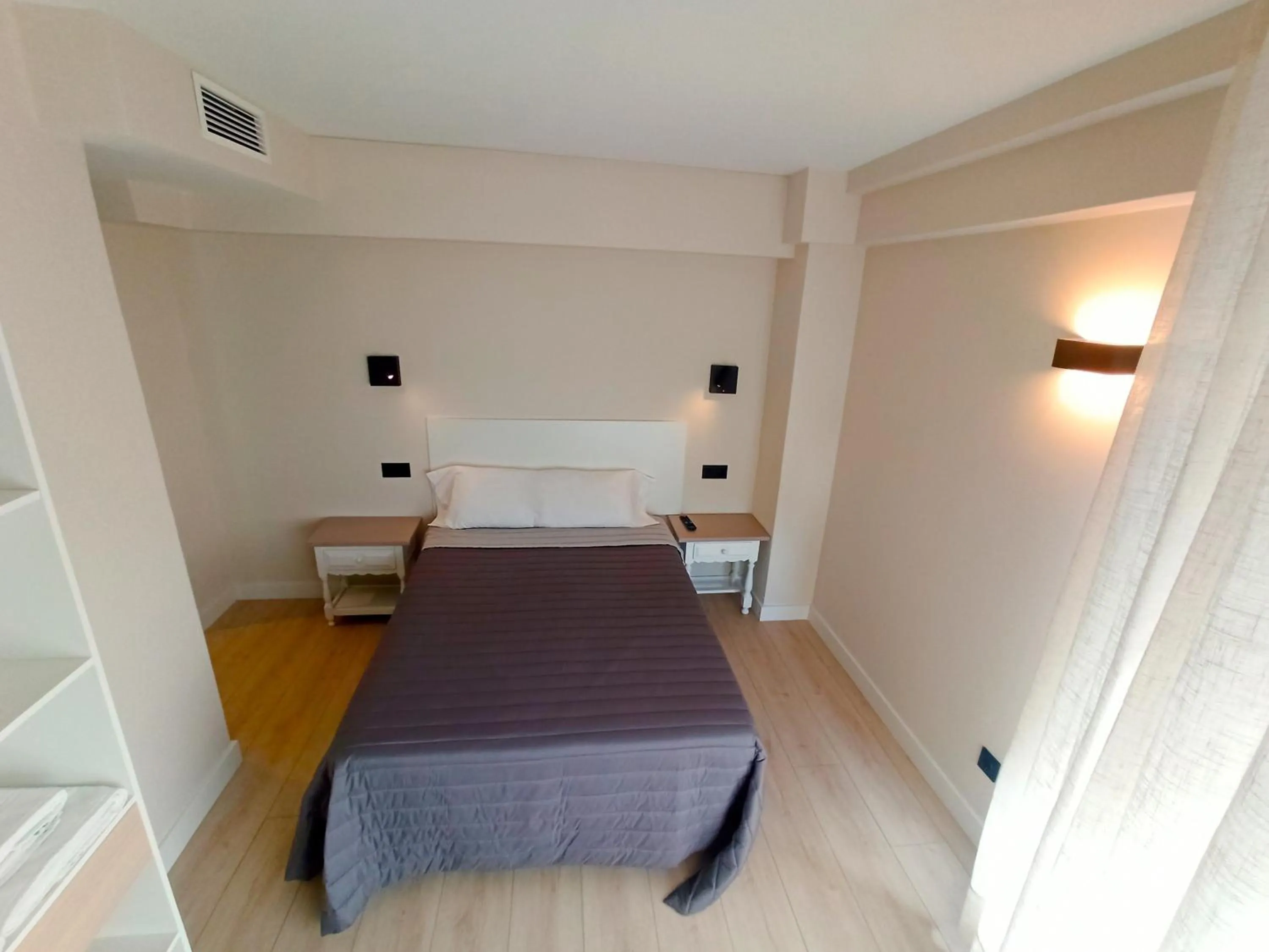 Bed in Bahia Rooms Cantabria 3000