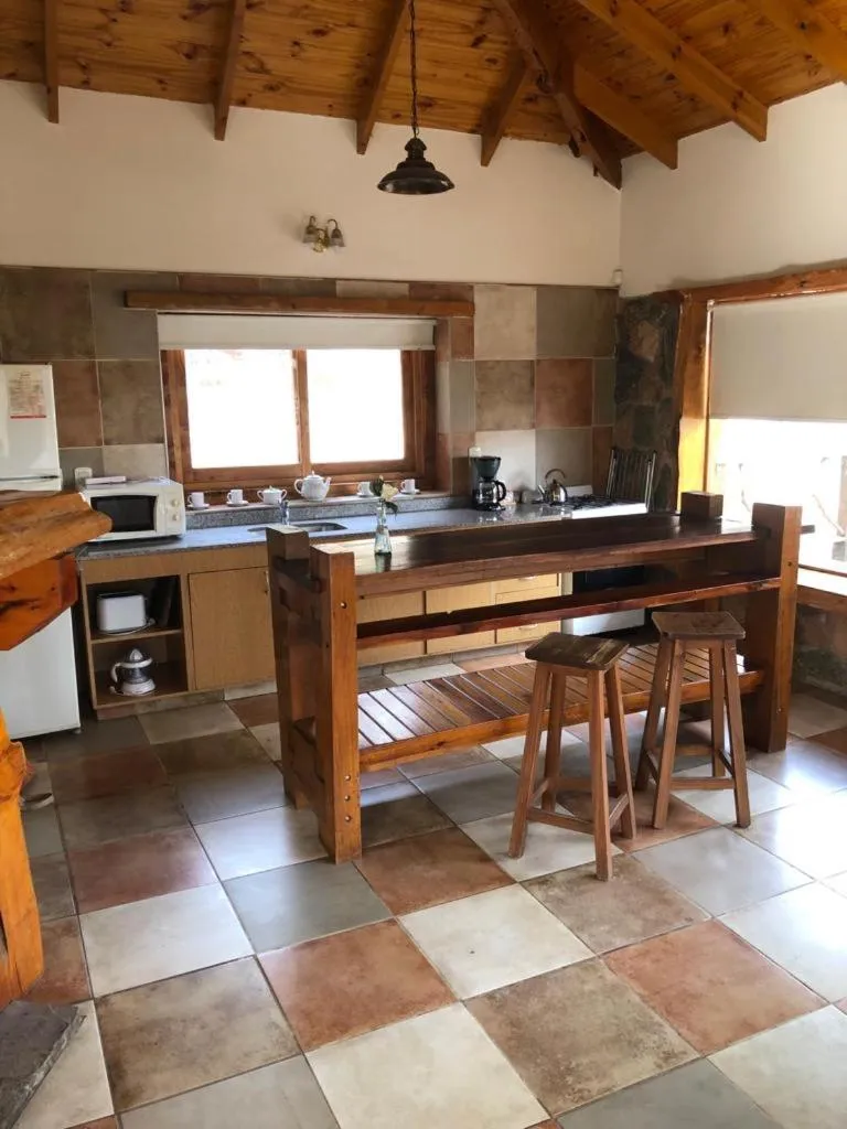 Kitchen or kitchenette in Cabañas Aufenthalt