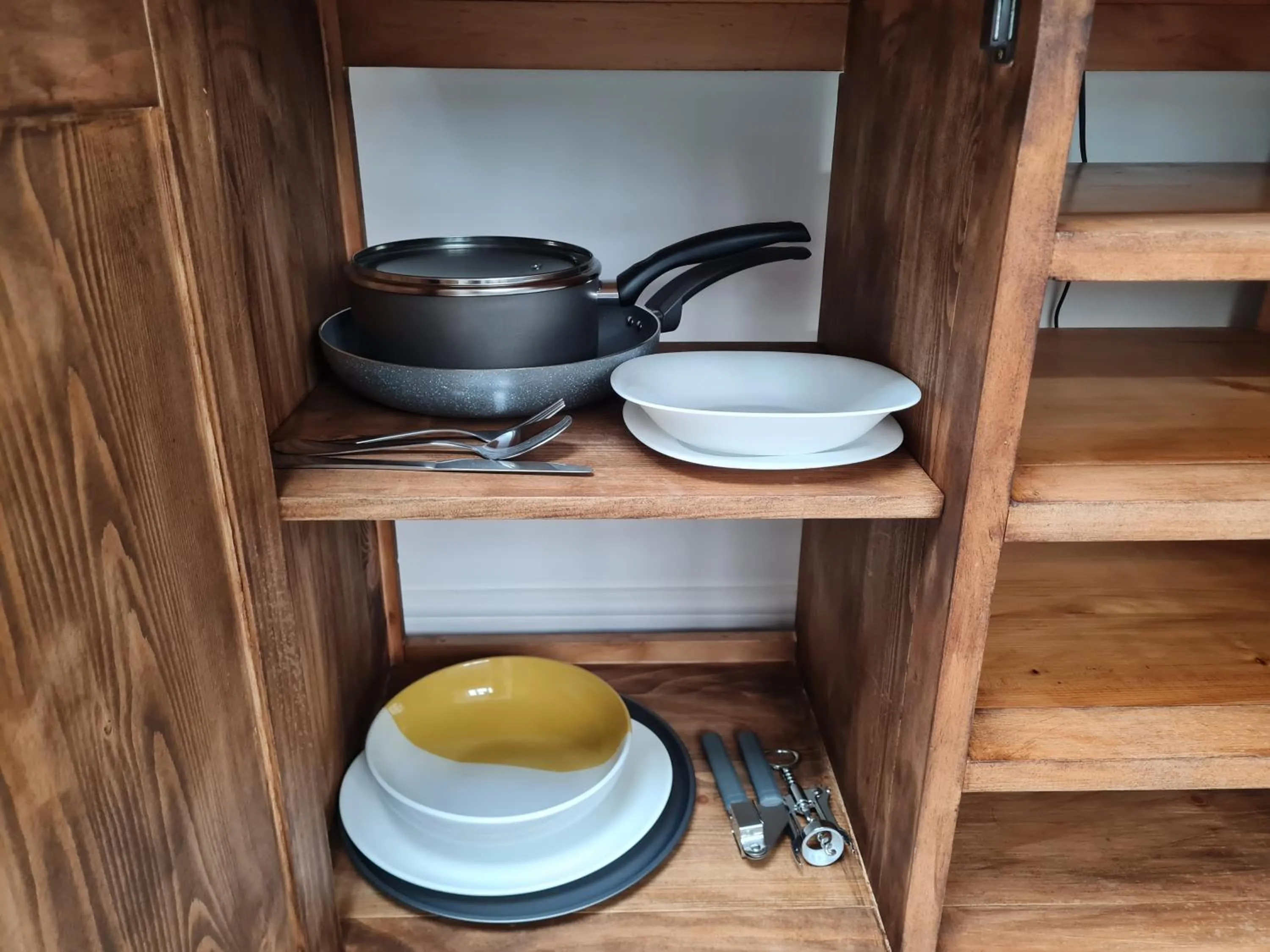 Kitchen or kitchenette in Stylish Suites with kitchenette