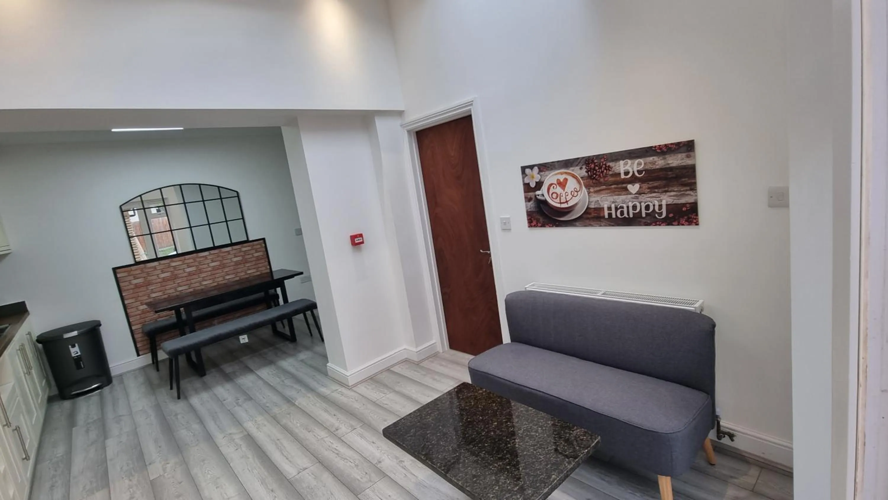 Living room in Stylish Suites with kitchenette