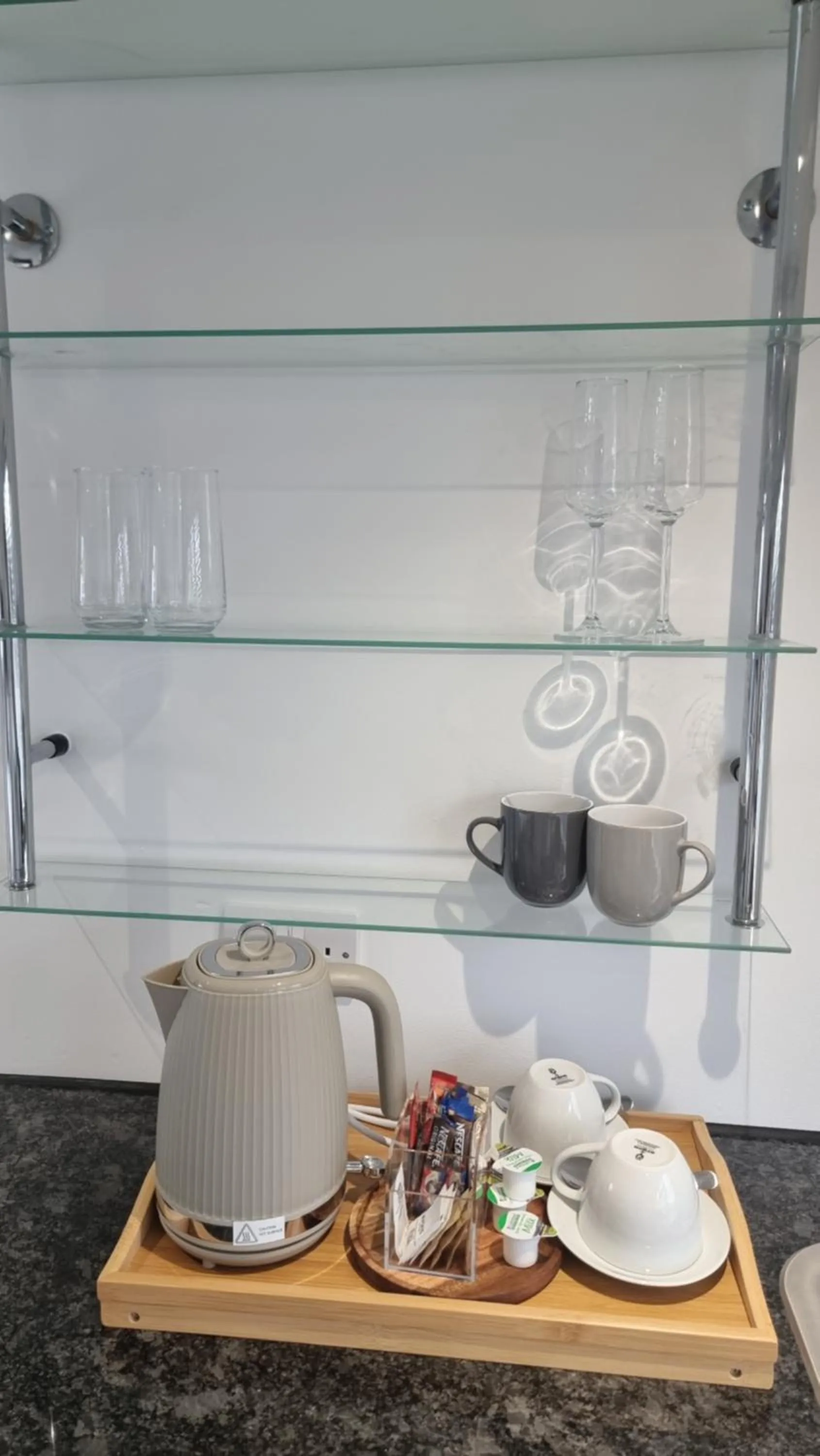 Kitchen or kitchenette in Stylish Suites with kitchenette