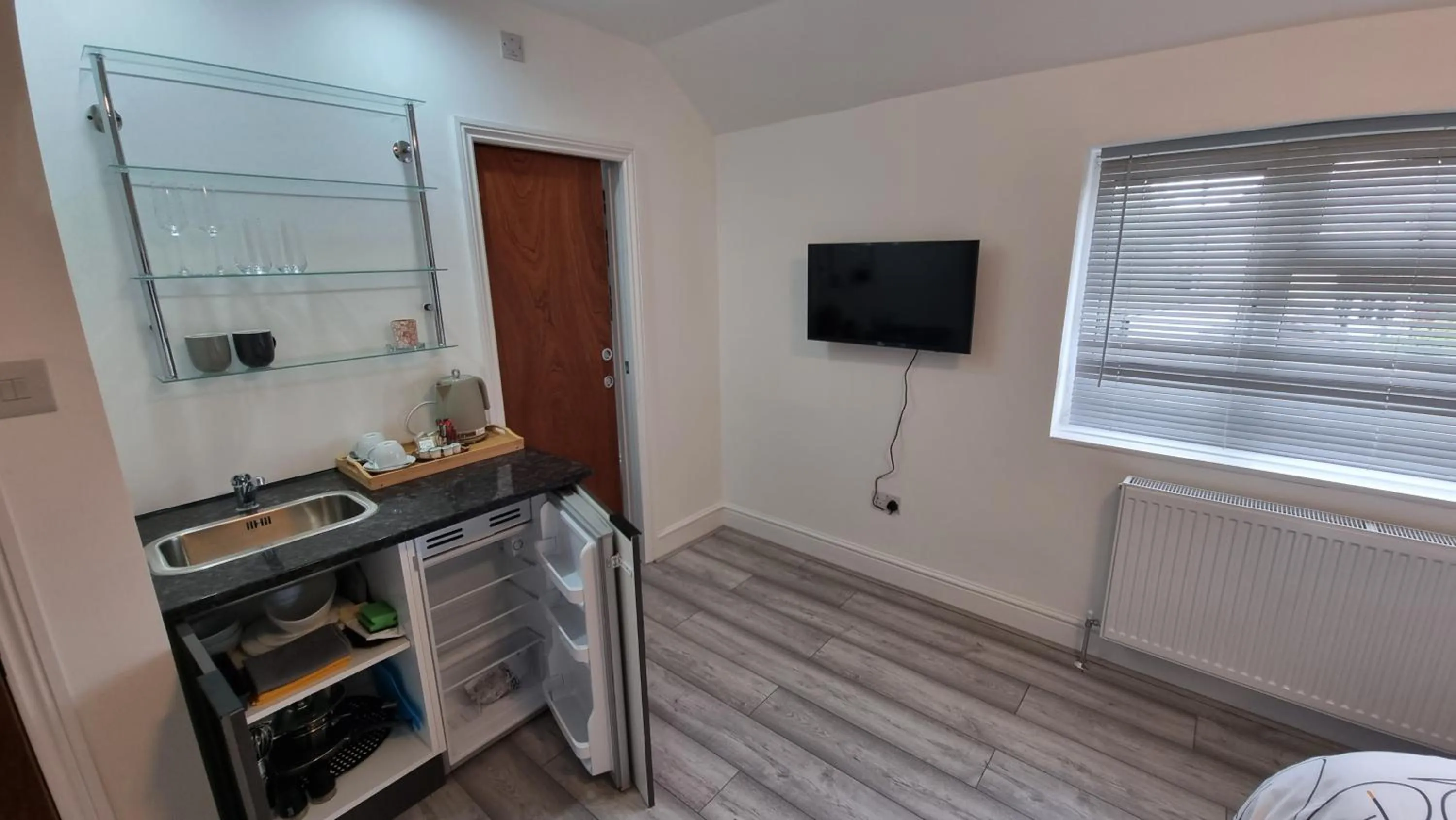 Kitchen or kitchenette in Stylish Suites with kitchenette