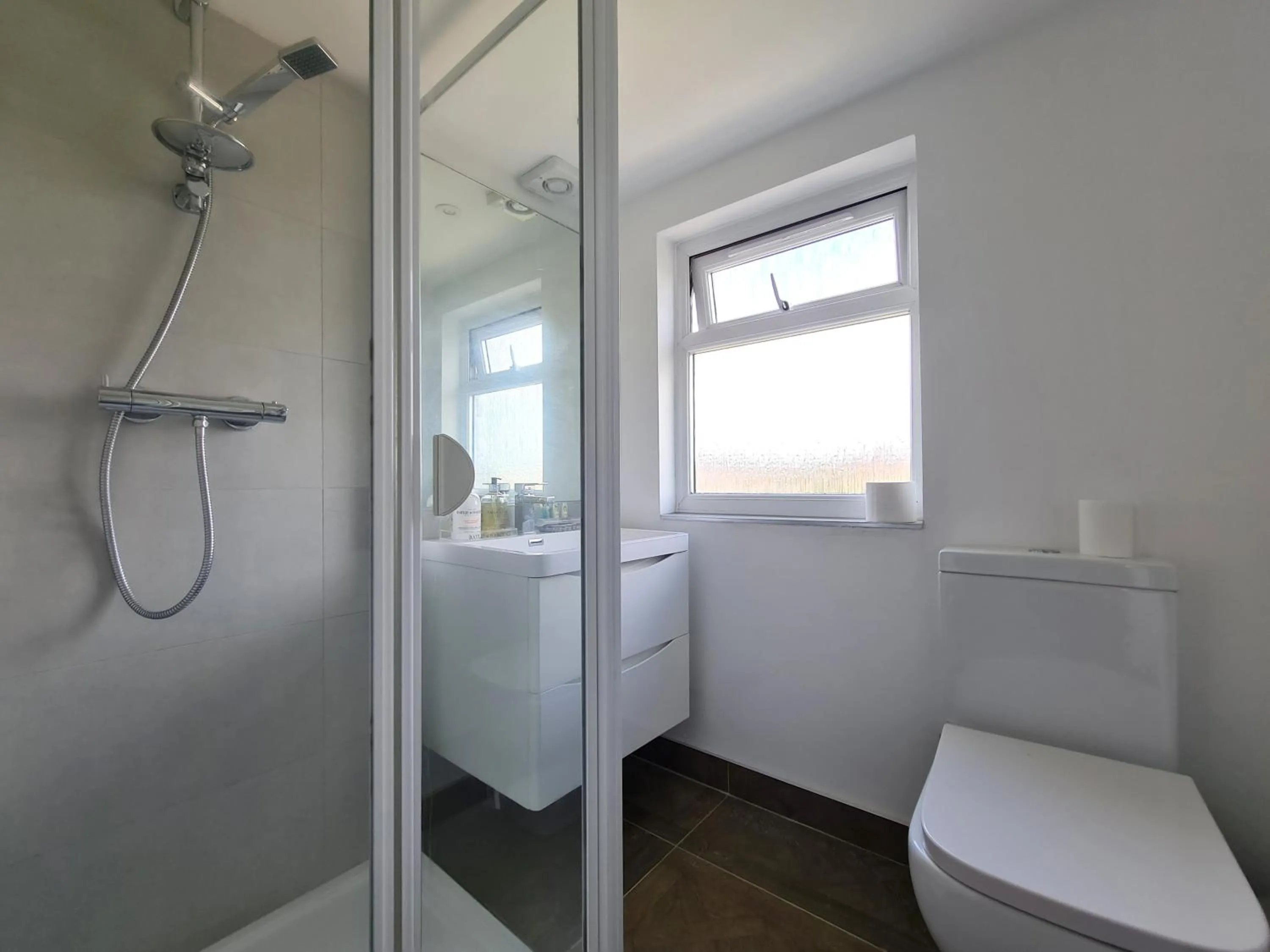 Shower in Stylish Suites with kitchenette