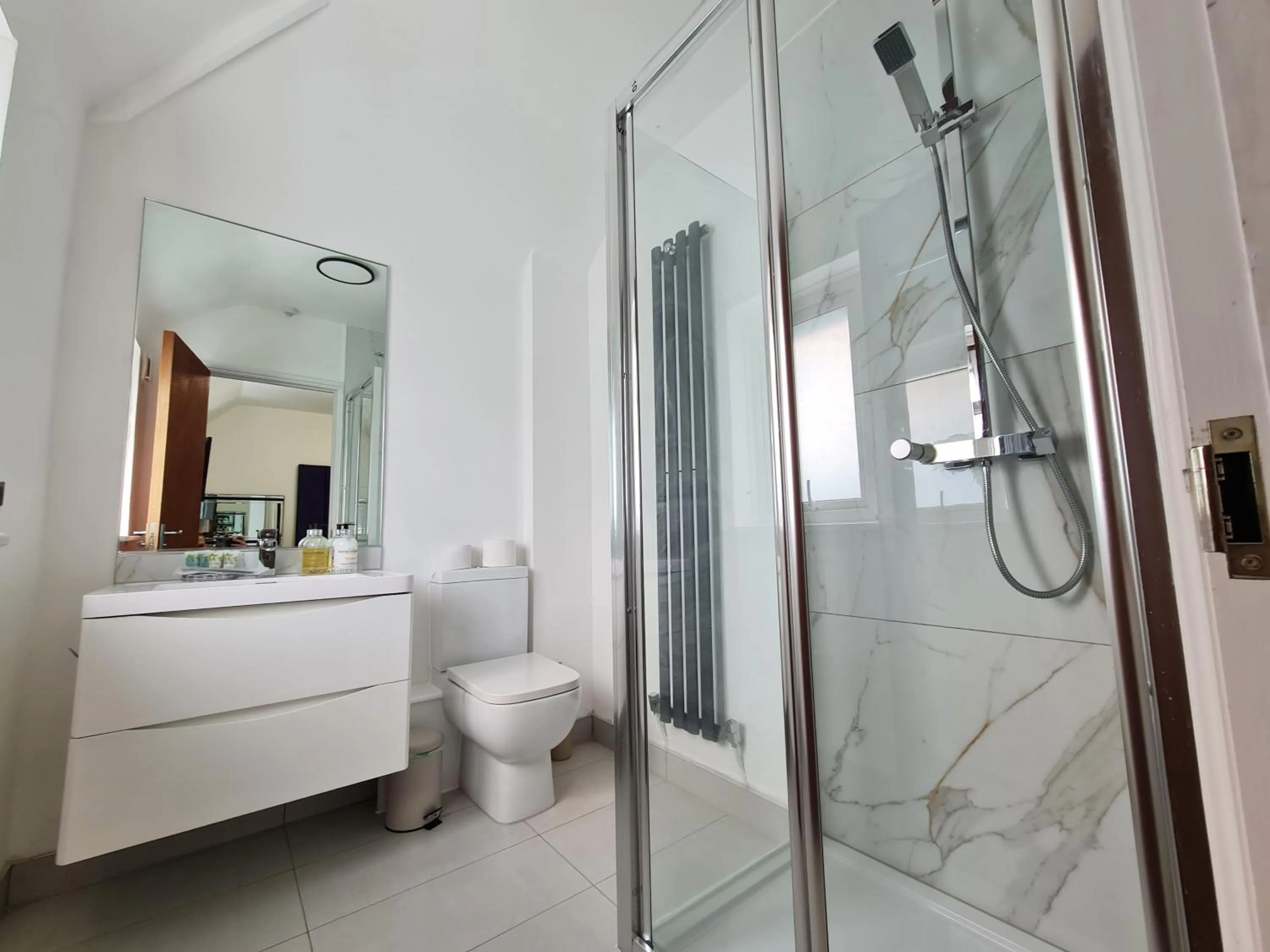 Shower in Stylish Suites with kitchenette